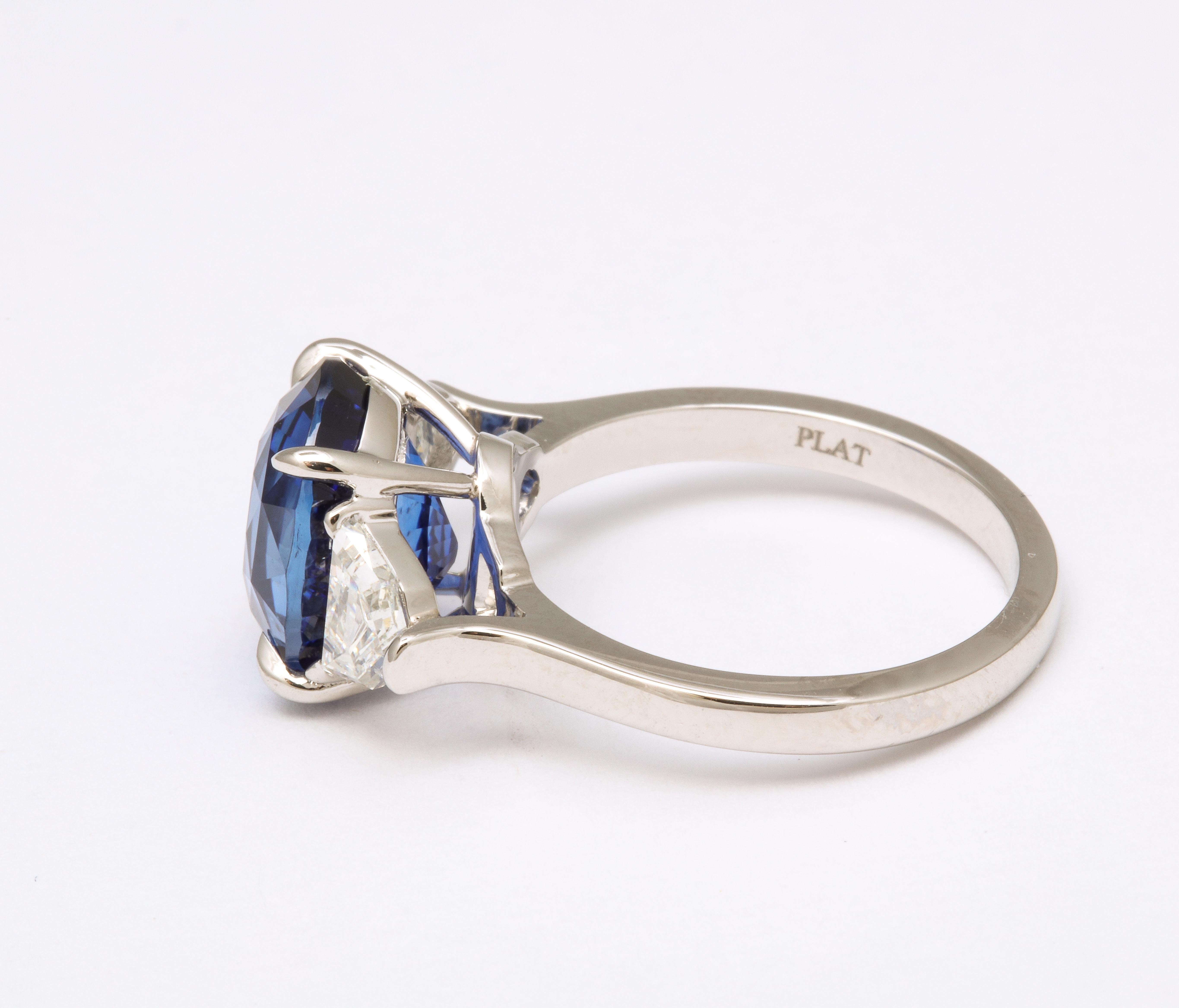 Oval Cut 6 Carat Oval Blue Sapphire and Diamond Ring For Sale