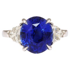 6 Carat Oval Blue Sapphire and Diamond Ring