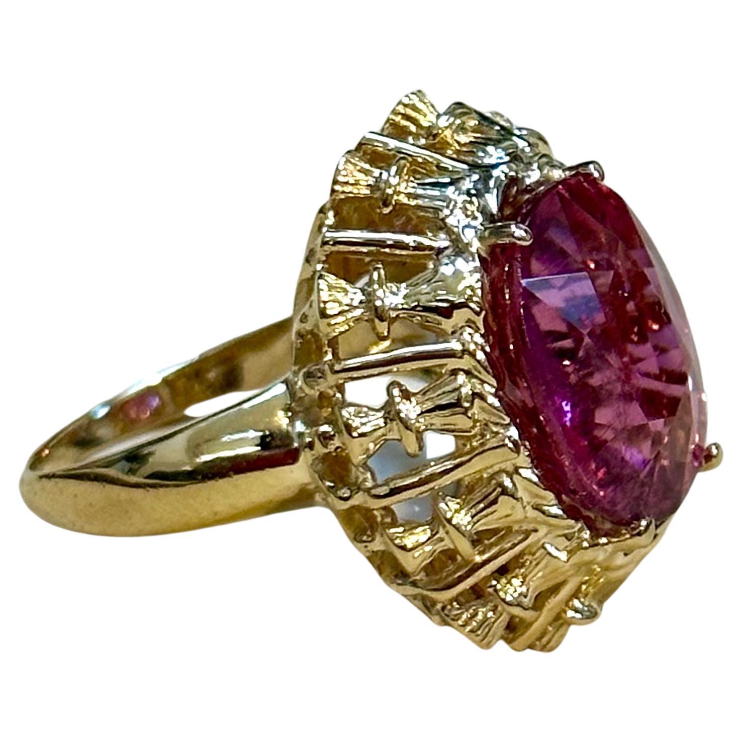 Approximately 6 Carat Oval Cut Natural Pink Tourmaline 14 Karat Yellow Gold Ring Size 5.5
6 Carat of Pink Tourmaline oval shape  surrounded by nice gold design.
Gold: 14 Karat Yellow  gold , Beautiful design
Weight: 10 gram Including stone

Ring