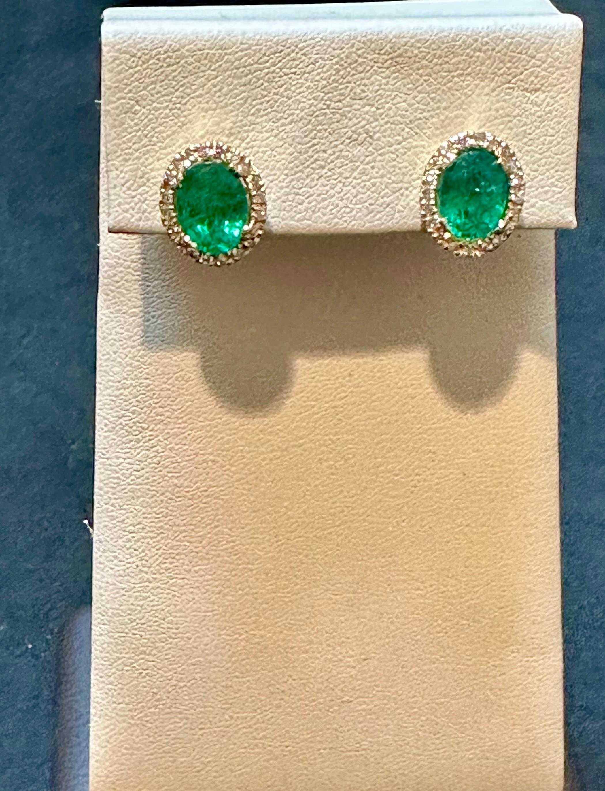 6 Carat Oval Shape Emerald and Diamond Post Back Earrings 14 Karat Yellow Gold For Sale 3