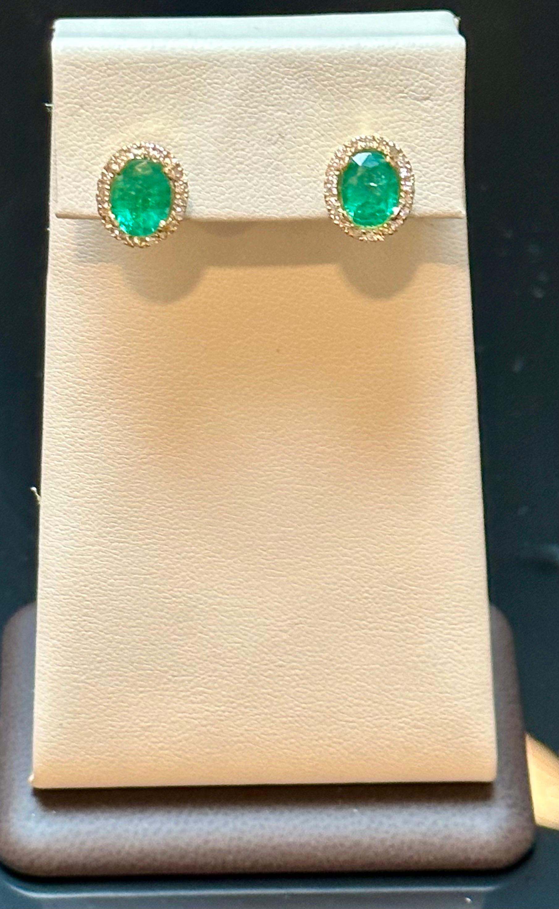 6 Carat Oval Shape Emerald and Diamond Post Back Earrings 14 Karat Yellow Gold In Excellent Condition For Sale In New York, NY