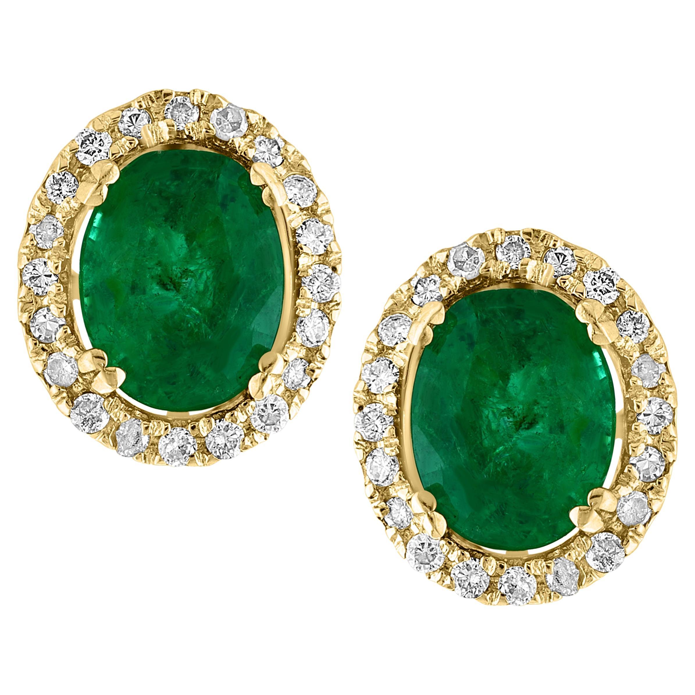 6 Carat Oval Shape Emerald and Diamond Post Back Earrings 14 Karat Yellow Gold For Sale