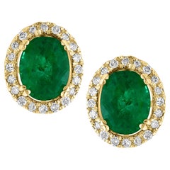 6 Carat Oval Shape Emerald and Diamond Post Back Earrings 14 Karat Yellow Gold