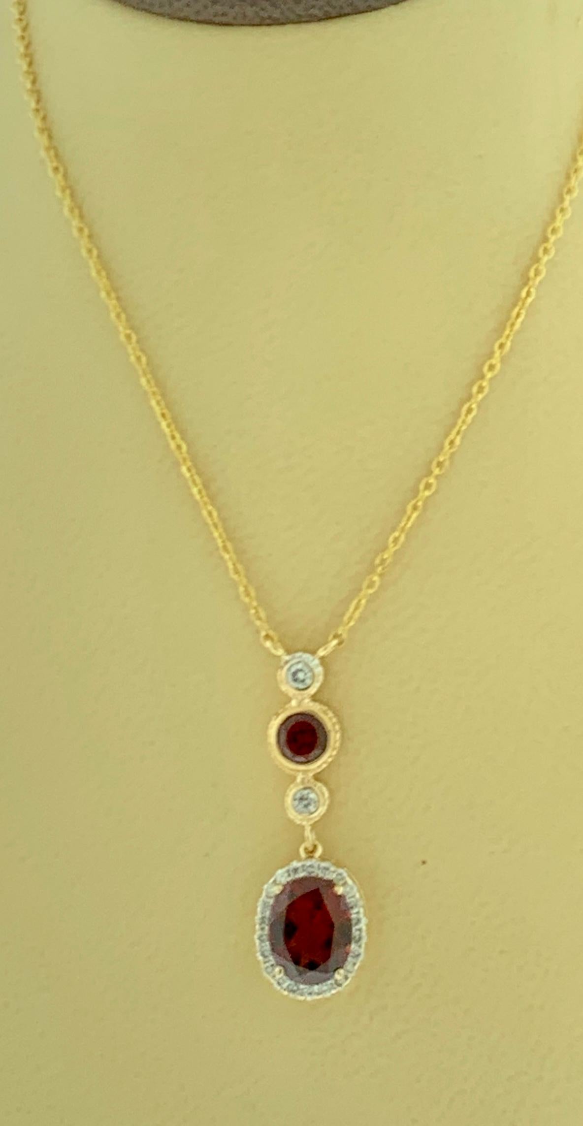 6 Carat Oval Shape Garnet and 0.6 Carat Diamond Necklace in 14 Karat Yellow Gold For Sale 3