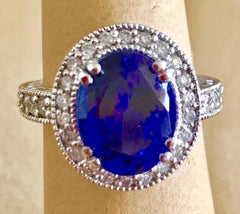 6 Carat Oval Tanzanite and 1 Carat Diamond Ring 14 Karat White Gold, Estate
