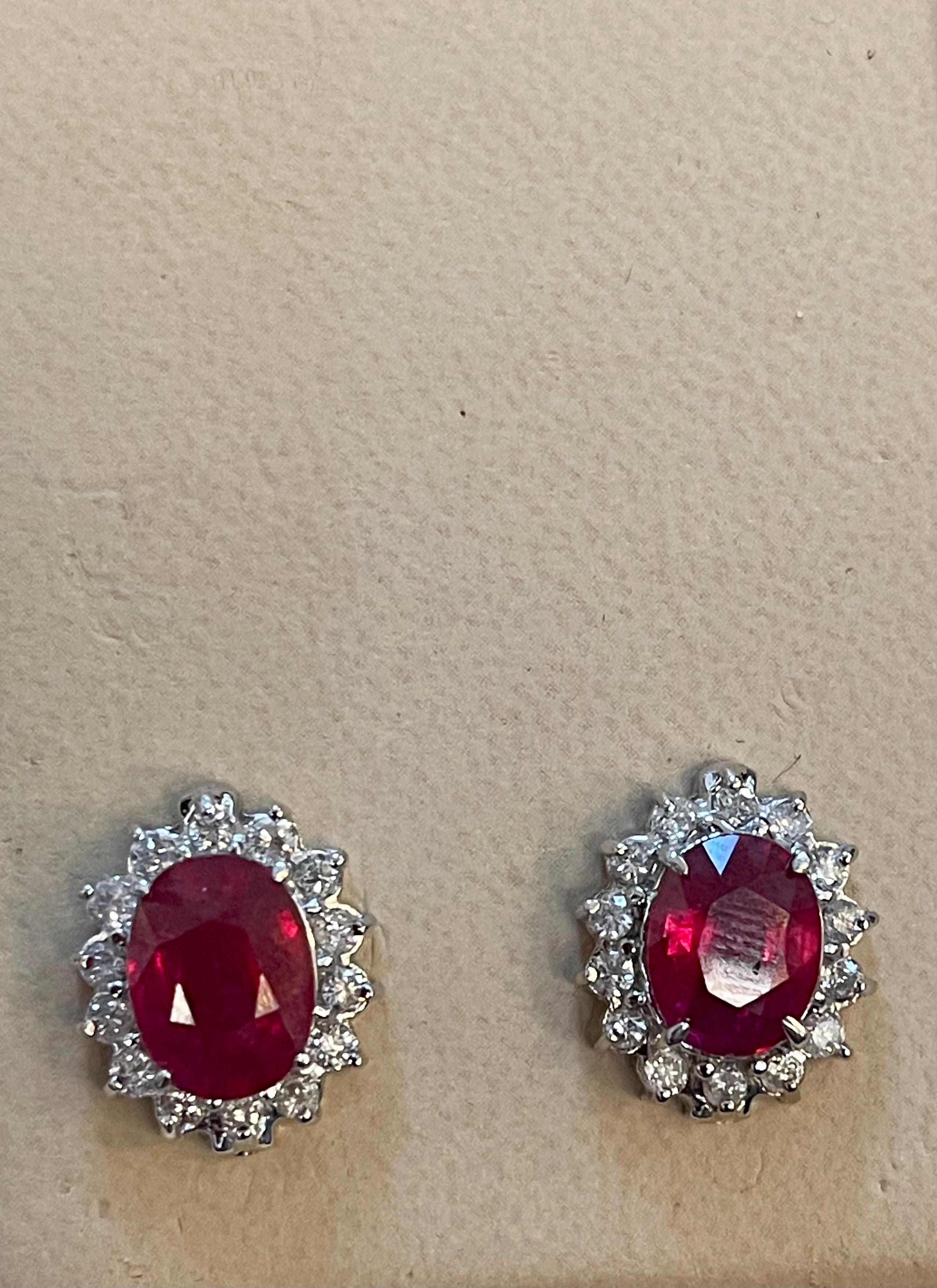 6 Carat Oval Treated Ruby & 1.2 Ct Diamond Stud Earrings 14 Karat White Gold For Sale 3