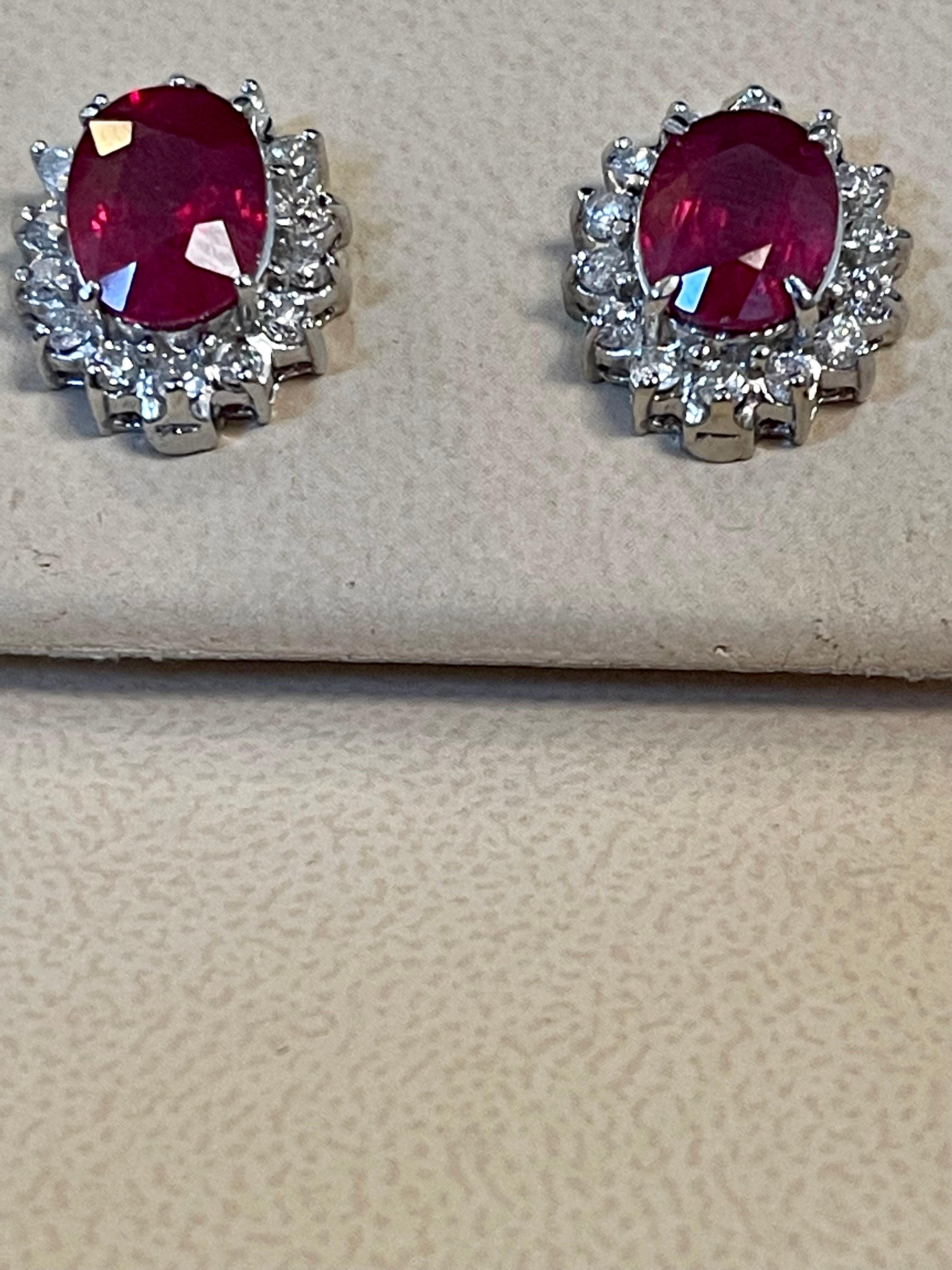 6 Carat Oval Treated Ruby & 1.2 Ct Diamond Stud Earrings 14 Karat White Gold For Sale 1