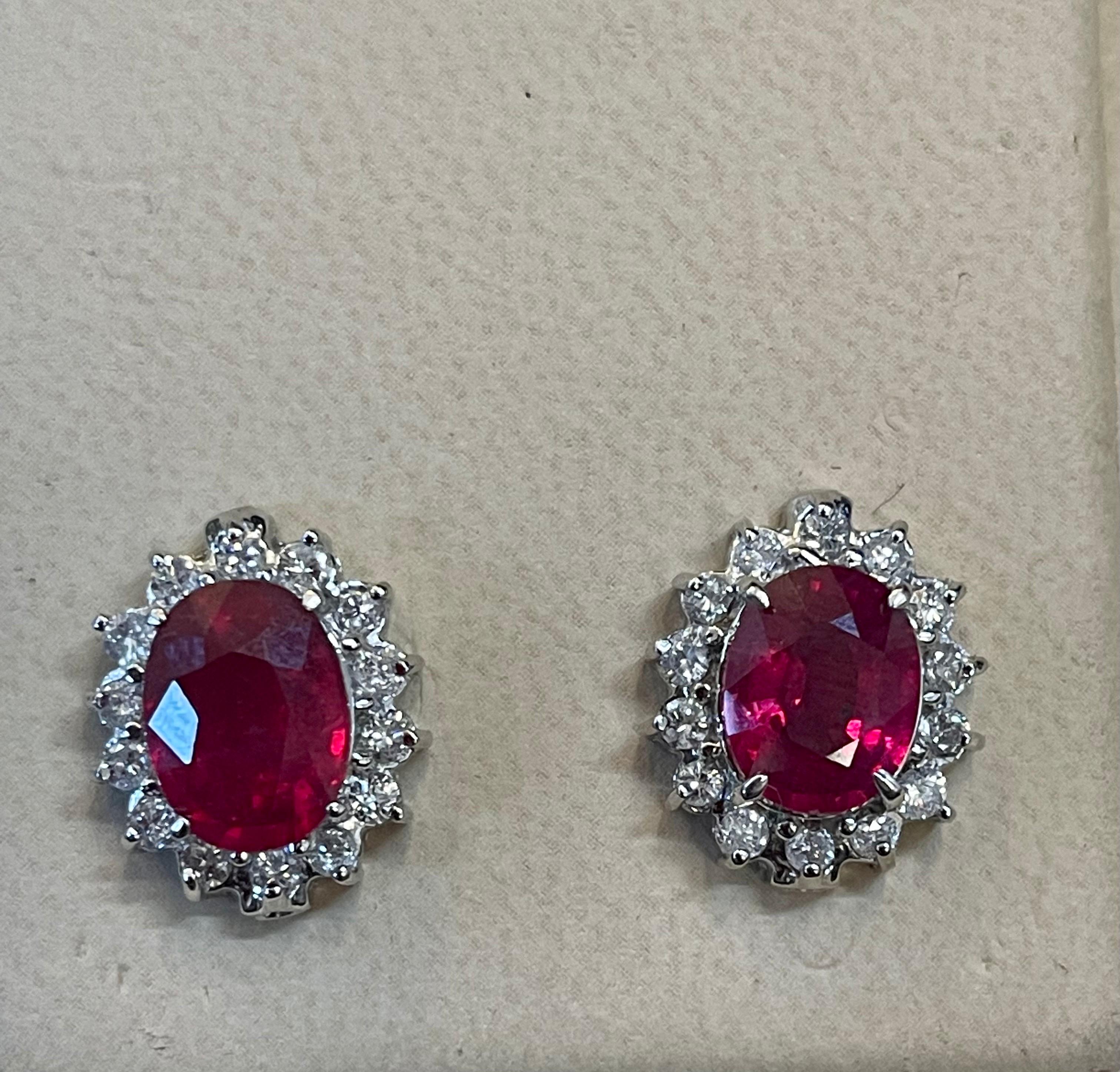 6 Carat Oval Treated Ruby & 1.2 Ct Diamond Stud Earrings 14 Karat White Gold For Sale 2