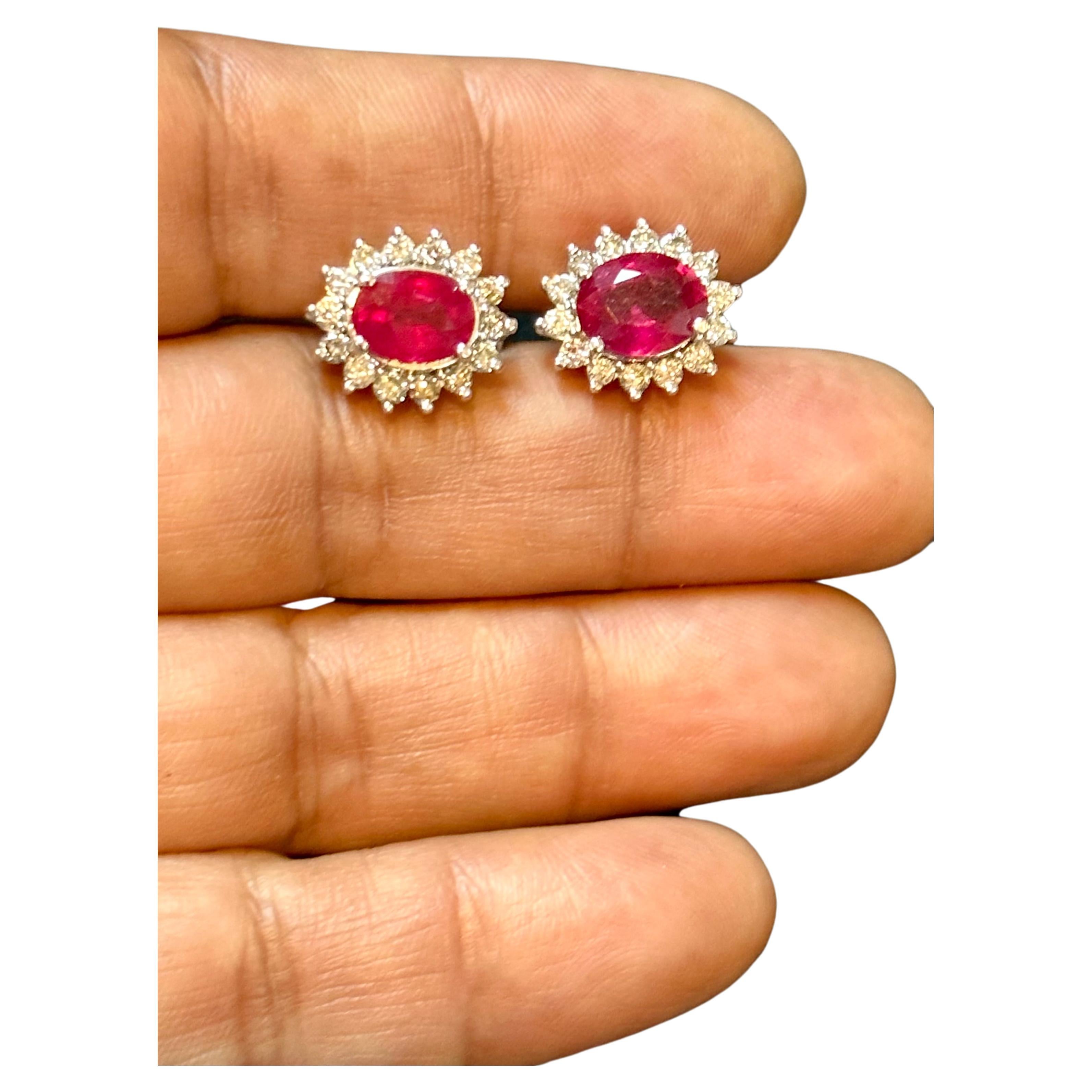 6 Carat Oval Treated Ruby & 1.2 Ct Diamond Stud Earrings 14 Karat White Gold For Sale