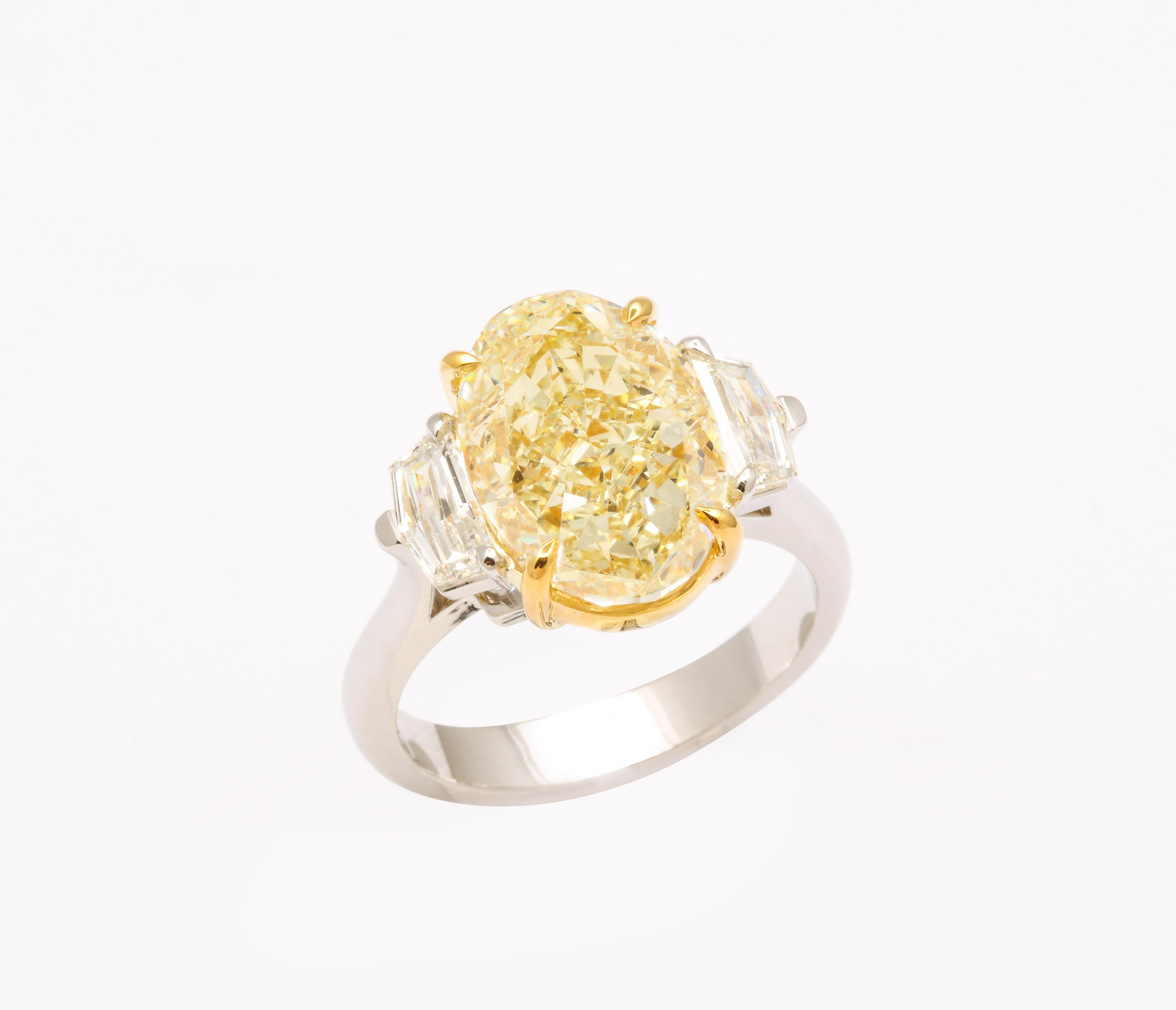 Women's or Men's 6 Carat Oval Yellow Diamond Ring Gia Certified For Sale