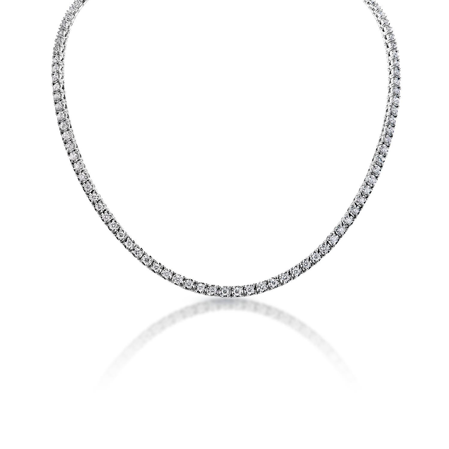 Diamond Tennis Necklace:

Carat Weight: 5.50 Carats
Style: Round Brilliant Cut
Chains: 14 Karat White Gold 25.90 grams
