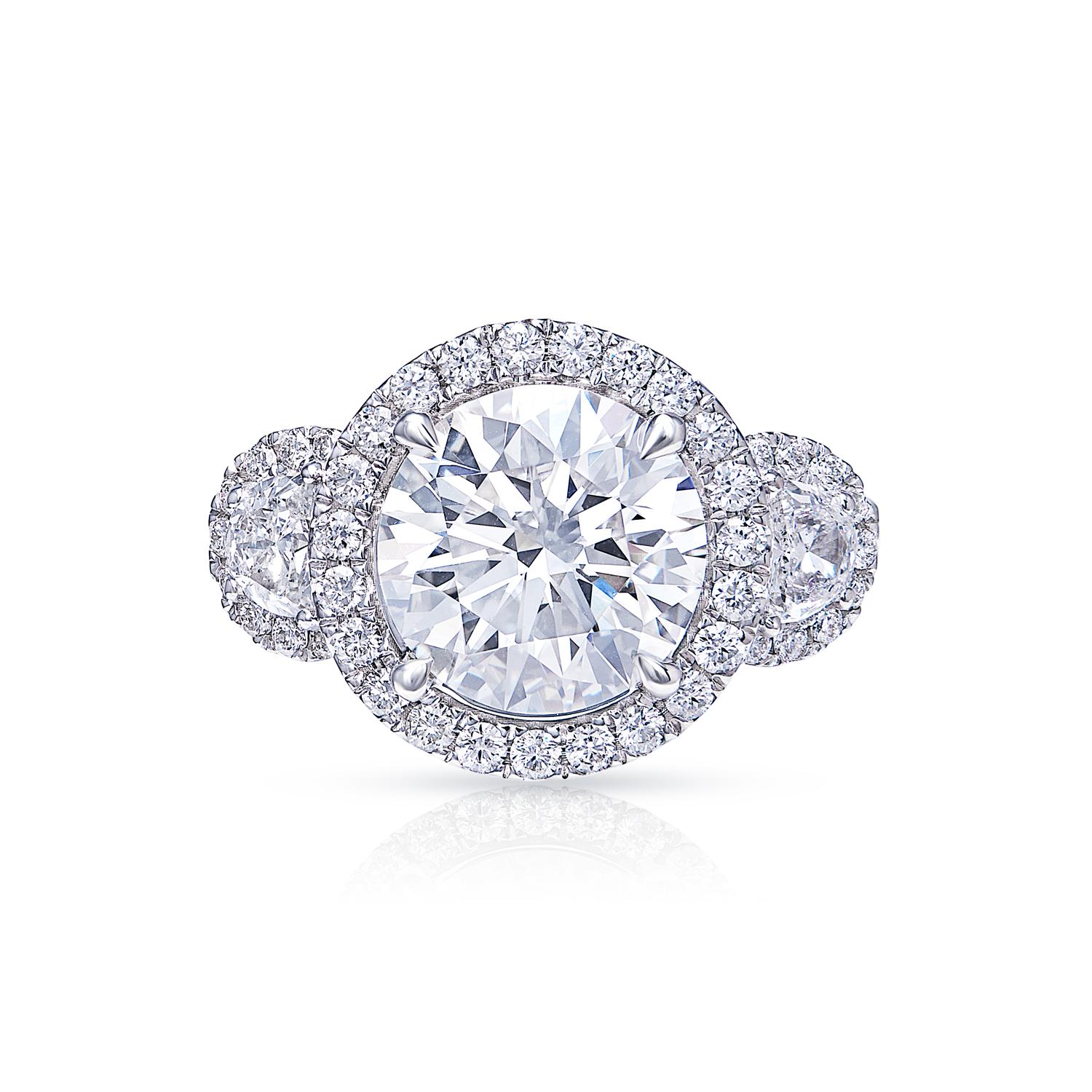 If you're looking for a diamond ring that is sure to impress, then look no further than this GIA-certified round brilliant diamond ring. The perfect symbol of your love and commitment, this ring features a stunning round diamond that has been