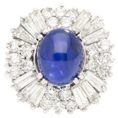 Bague en platine avec saphir de Birmanie étoilé bleu royal de 6 carats sans chaleur et halo de diamants