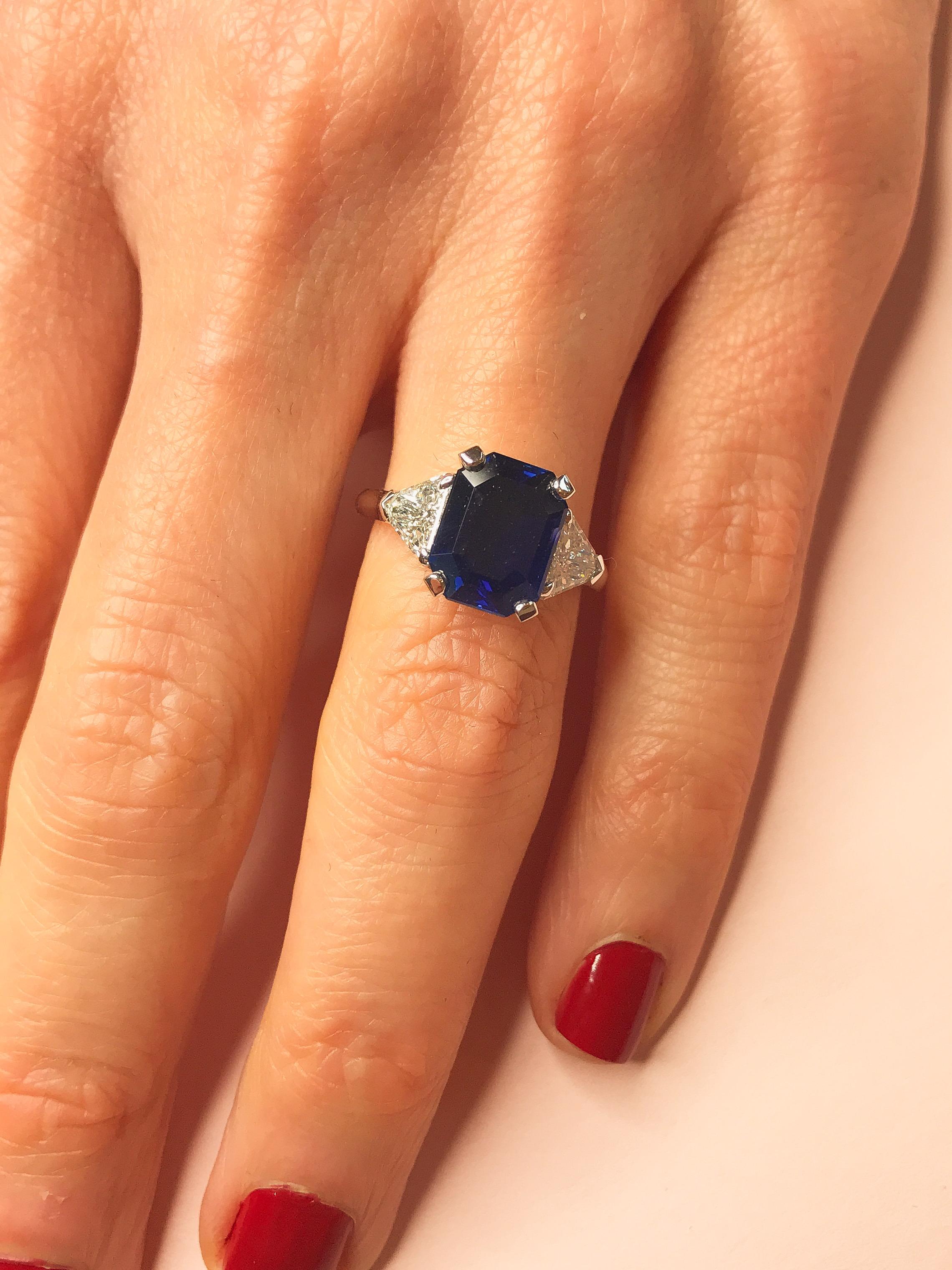 Perfect as a striking engagement ring or to mark another memorable occasion, this classic white gold ring is a one-off, just like its wearer. The rich, blue sapphire at its centre was specially selected by the Haruni family and its octagon cut is