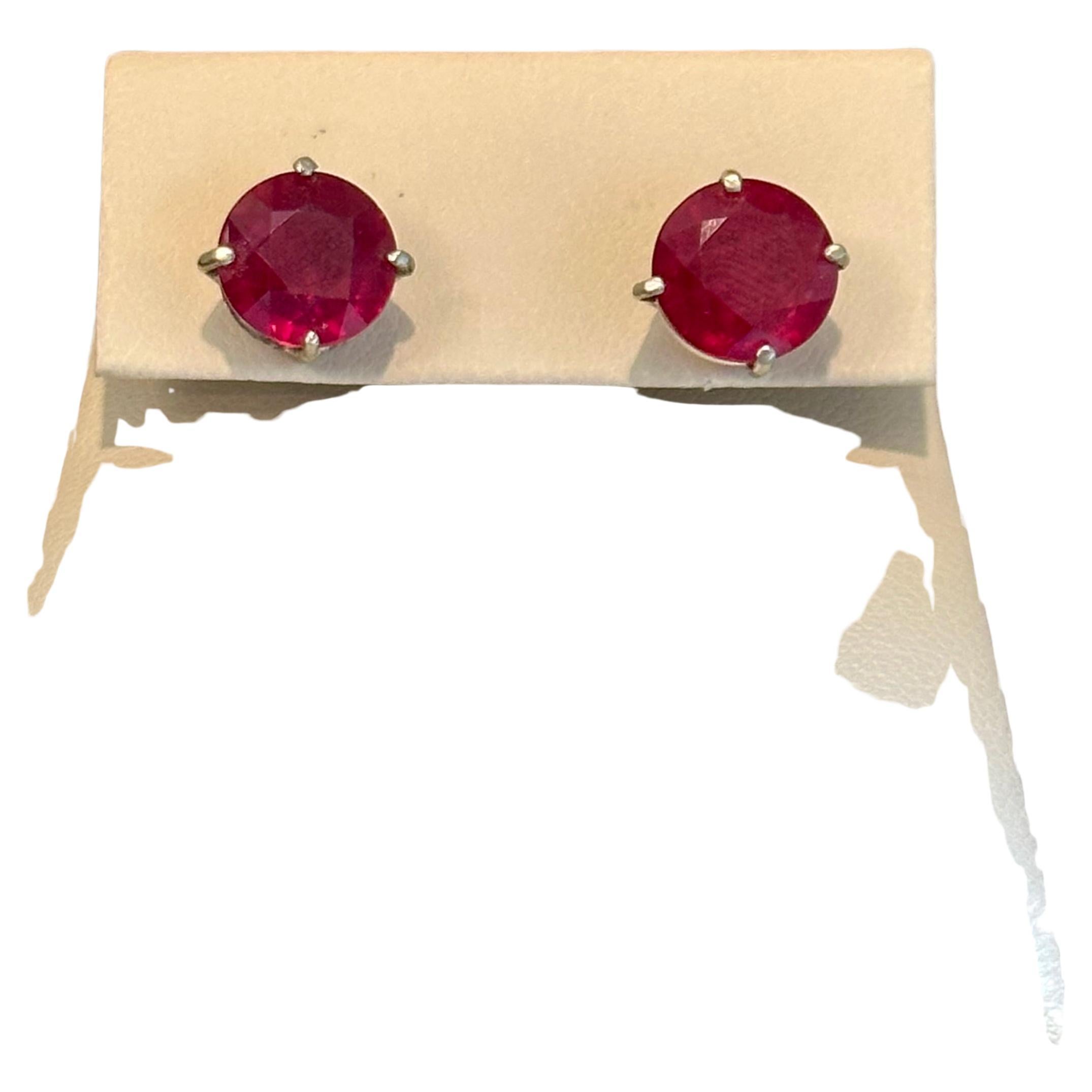 Special Price , Special offer
selling them at my cost !!

A sweet, shimmery style for any day of the week. These stud earrings 3 carat  each Solitaire round Treated Ruby
Set in 14 kt White gold. Post, Screw back Ruby stud earrings.
Best For Every
