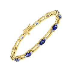 6 Carat Tanzanite and 0.45 Carat Diamond Tennis Bracelet 14 Karat Yellow Gold