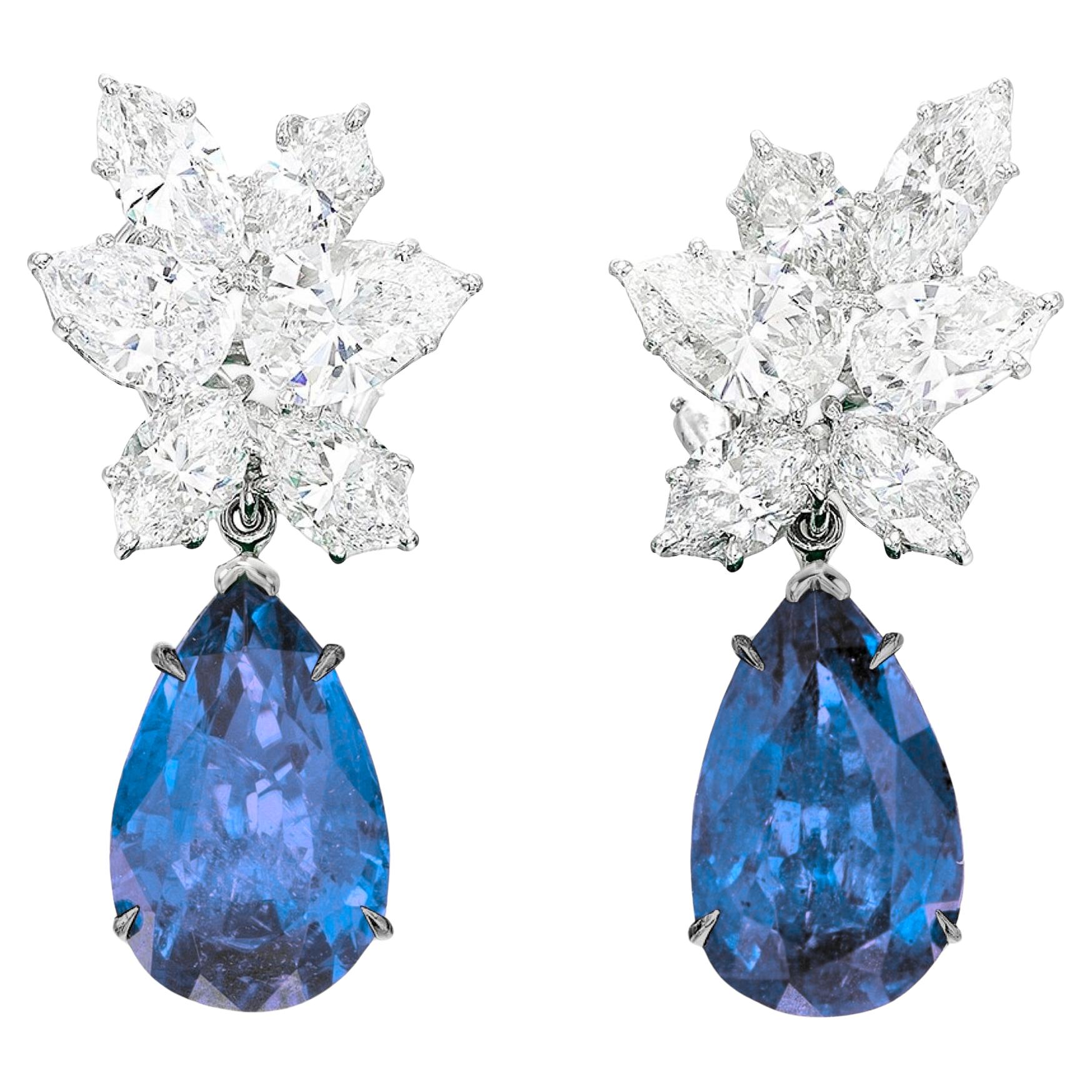 Modern 6  Carat Vivid Blue Pear Shape Sapphires White Gold Earrings For Sale