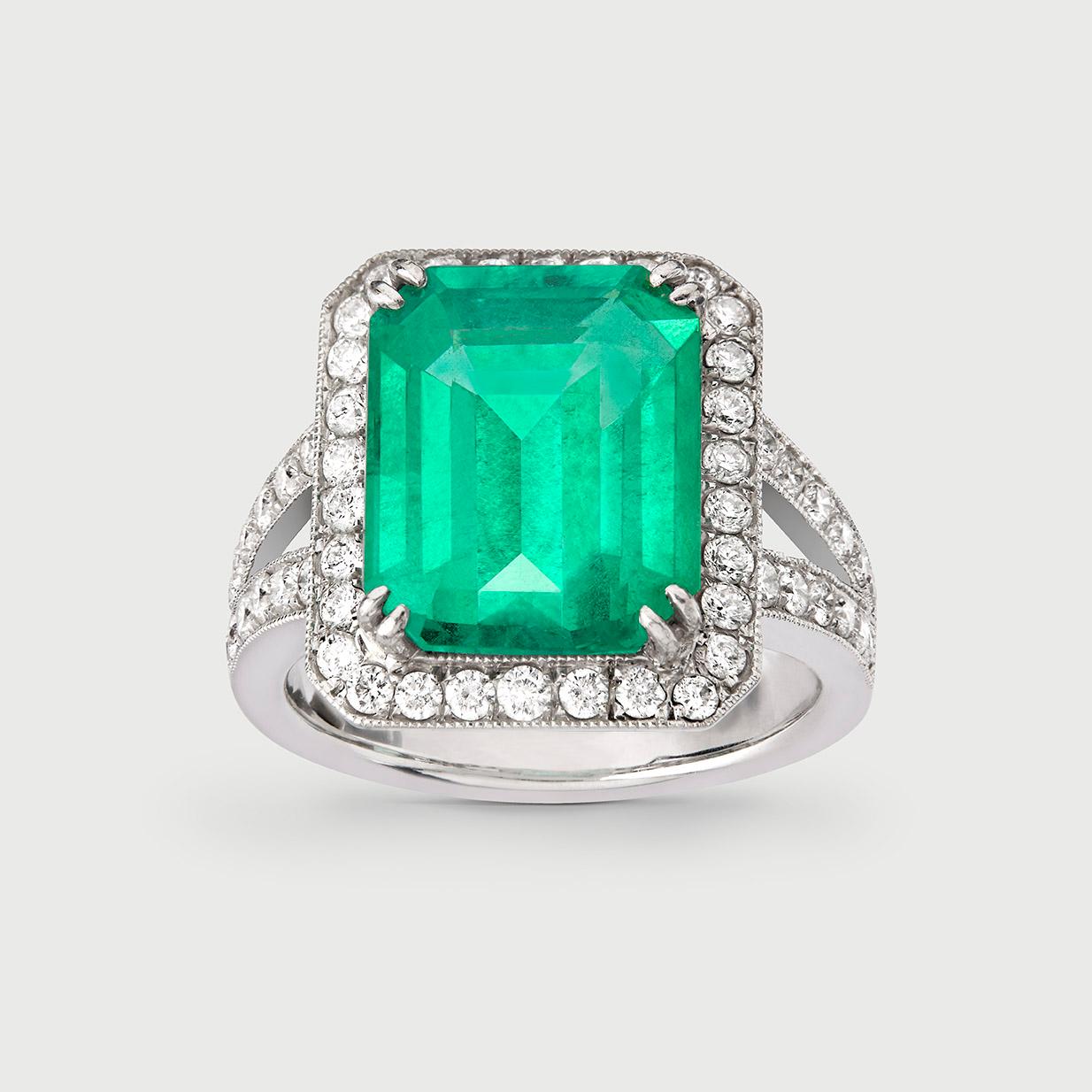 This 6 carats Colombian Emerald and Diamond Cocktail Ring is handcrafted in 18K white gold and made in Italy. 

Gemstones are natural and not treated. Emerald certificate is available upon request.  This ring is only made to order. 
It can be
