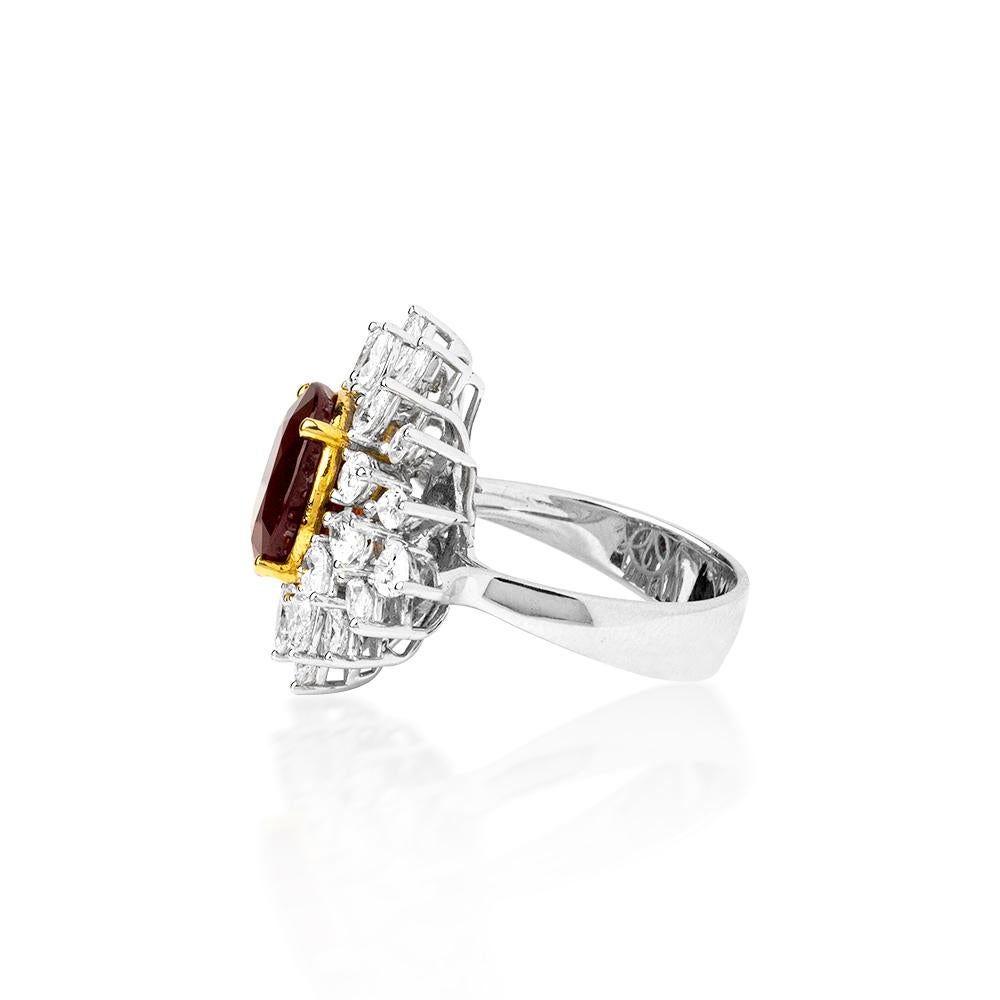  For the Love of Red !
This beautiful piece has a 6 carats of Natural deep red color Ruby with an amazing clarity. 2.97 Carats of  -D to F color VVS- Diamonds perfectly set on 18K White Gold .
Stone : 6.00 Ct's / Natural Ruby
Diamonds : 2.97 Ct's D