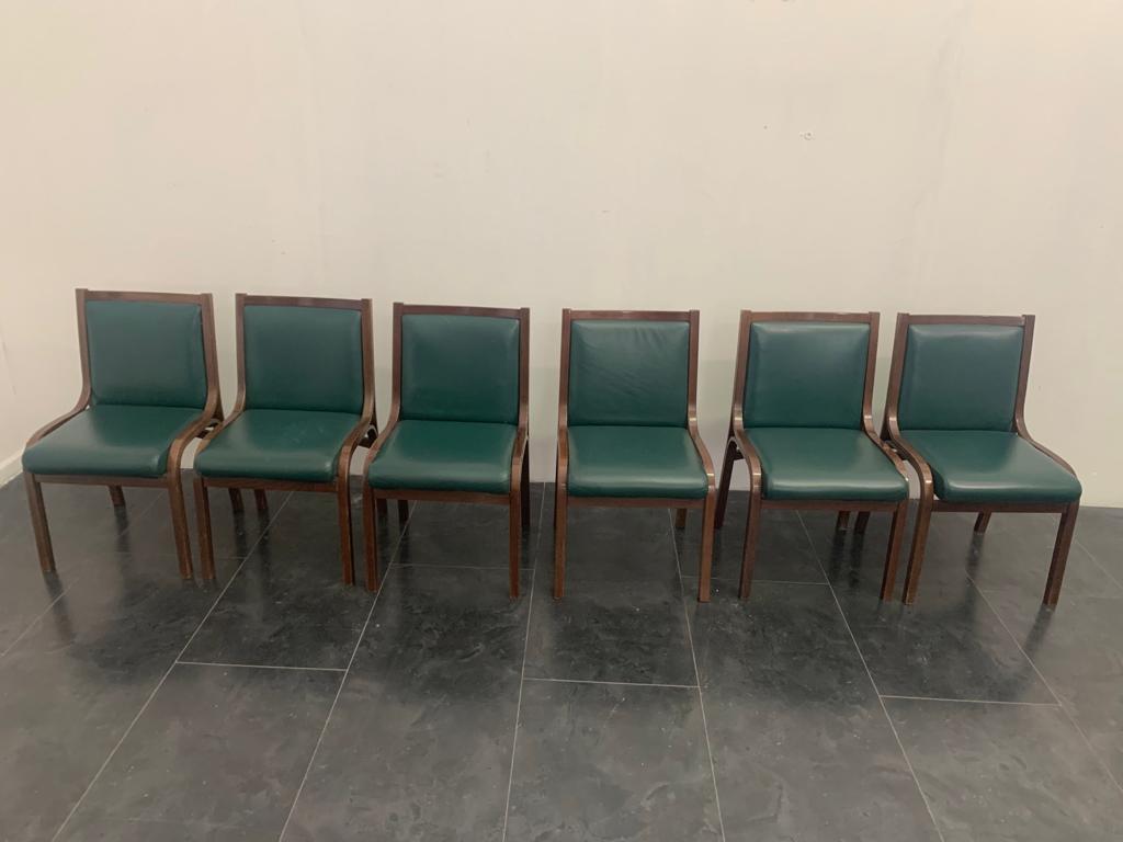 6 Chairs by Gregotti Associati for Poltrona Frau, 1950s.
Price shown is for a set of 6 chairs. Available are 5 sets.

Packaging with bubble wrap and cardboard boxes is included. If the wooden packaging is needed (fumigated crates or boxes) for US