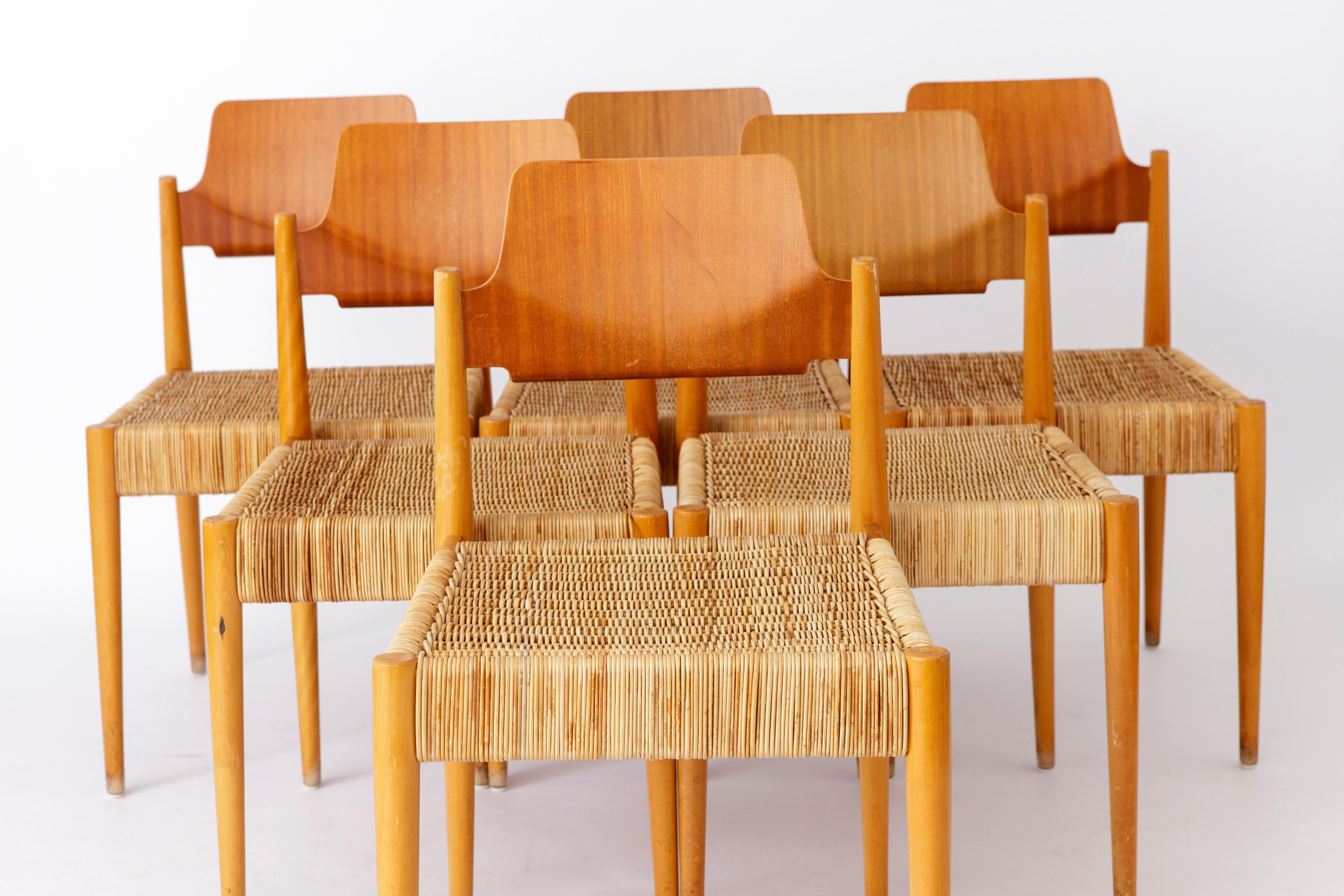 6 unique chairs from Germany Bauhaus designer Egon Eiermann for the manufacturer Wilde + Spieth. 
Model: SE19 from 1953. 
The chairs were used in an old church and have a shelf in the back for a hymnal. 
Beech wood frame in good stable condition, as