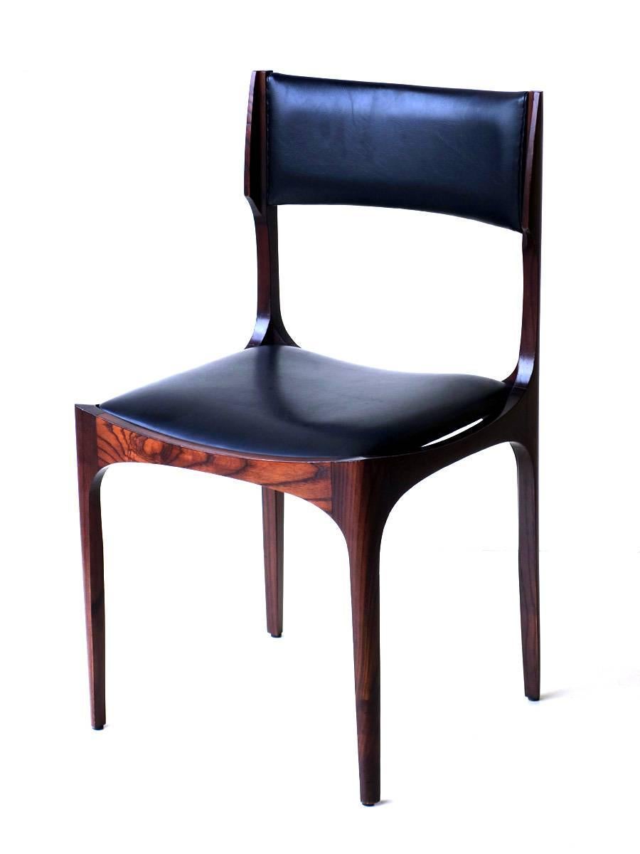 Giuseppe Gibelli by Sormani
Set of six chairs
Rosewood and black leather
Excellent condition.
