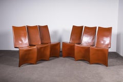6 chaises en cuir cognac Ed Archer de Philippe Starck pour Driade / Aleph