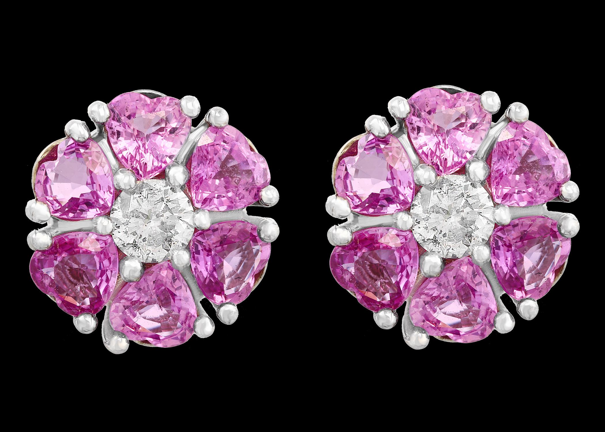 
6 Ct Heart Shape Pink Sapphire &  and Solitaire Diamonds Flower Post Earrings 14 Karat White Gold 15 MM wide flower
6 Carat Heart shape natural pink sapphire   and 0.80  ct  solitaire diamond flower earrings
Each earring has 6 Pink sapphires  each