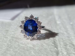 6 Ct Royal Blue Sapphire, Lady Diana inspired ring and 1.00 Ct Natural Diamonds