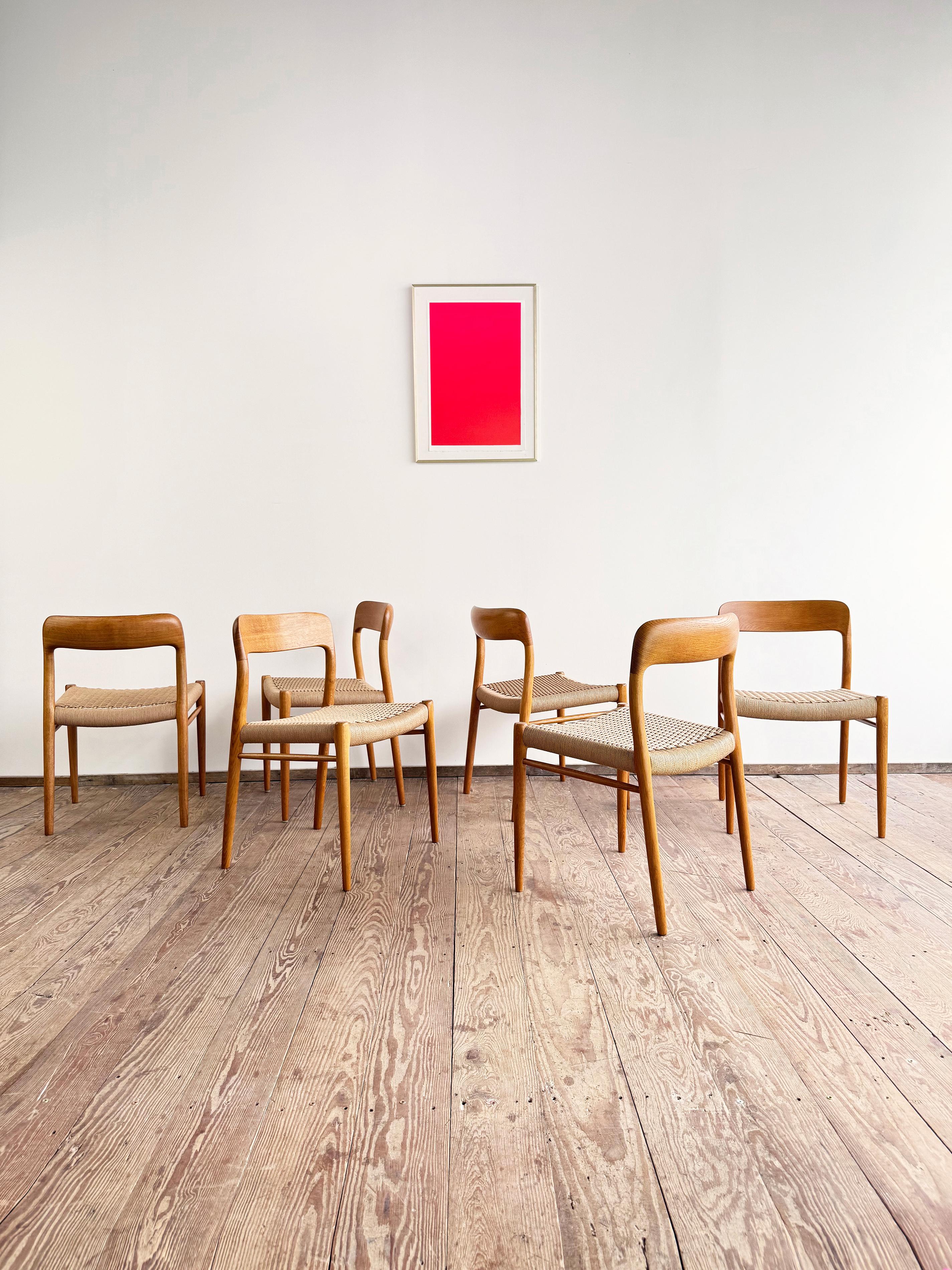 Dimensions: 50x47x75x44cm (Width x Depth x Height x Seat Height)

Danish Design by Niels O. Møller manufacured by J.L. Møllers in Denmark in the 1950s. The set features 6 oak wood chairs of Niels O. Møllers famous model 75, a Scandinavian design