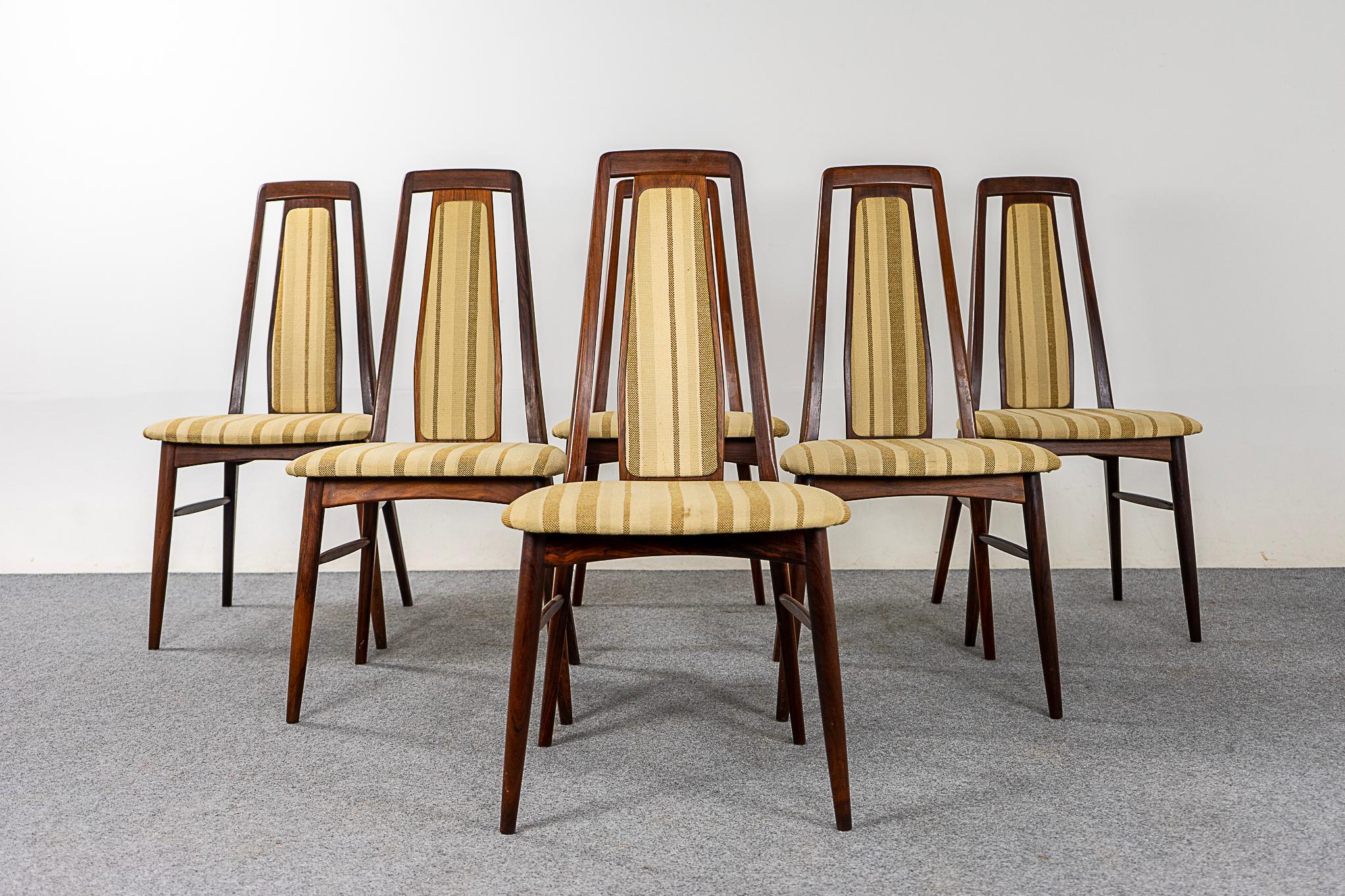 Rosewood Danish modern dining chairs by Niels Koefoed, circa 1960's. Beautifully tapered high back chairs. Solid wood frame with cross braces for stability and support. Original condition with signs of use and age, minor staining on