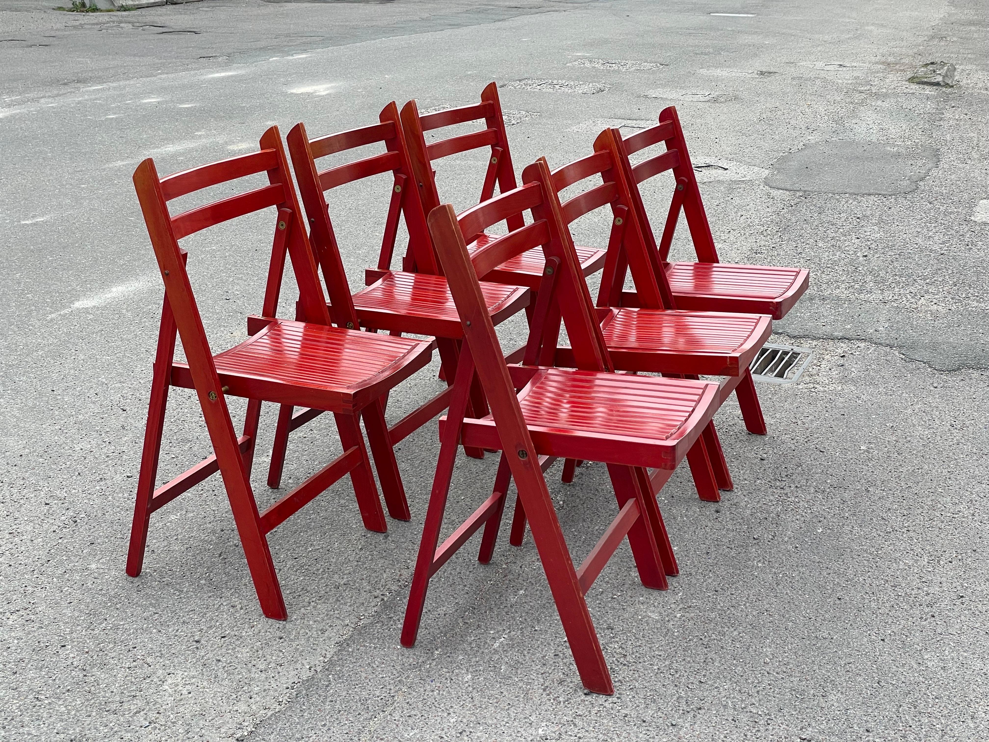 Beautiful well kept red foldable chairs from the late 1970's.