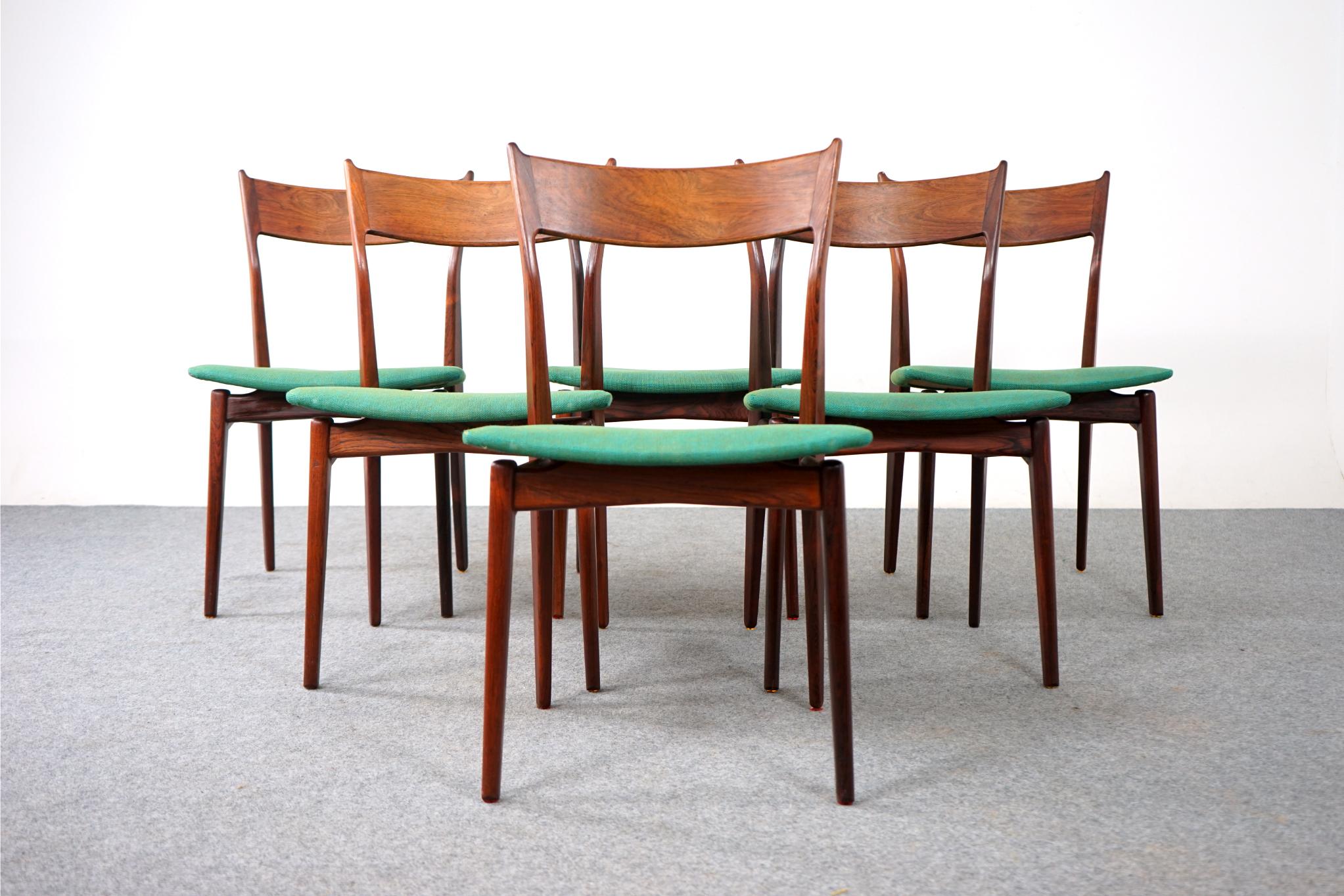 Rosewood Danish dining chairs by HP Hansen for Randers, circa 1960's. Robust, yet refined. Sculptural lines and floating seat add an air of lightness and elegance to the stunning frame. Beautifully curved backrests and generous seats provide support