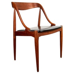 6 Danish Teak and Leatherette chairs, model 16 ohannes Andersen for Uldum 1960.