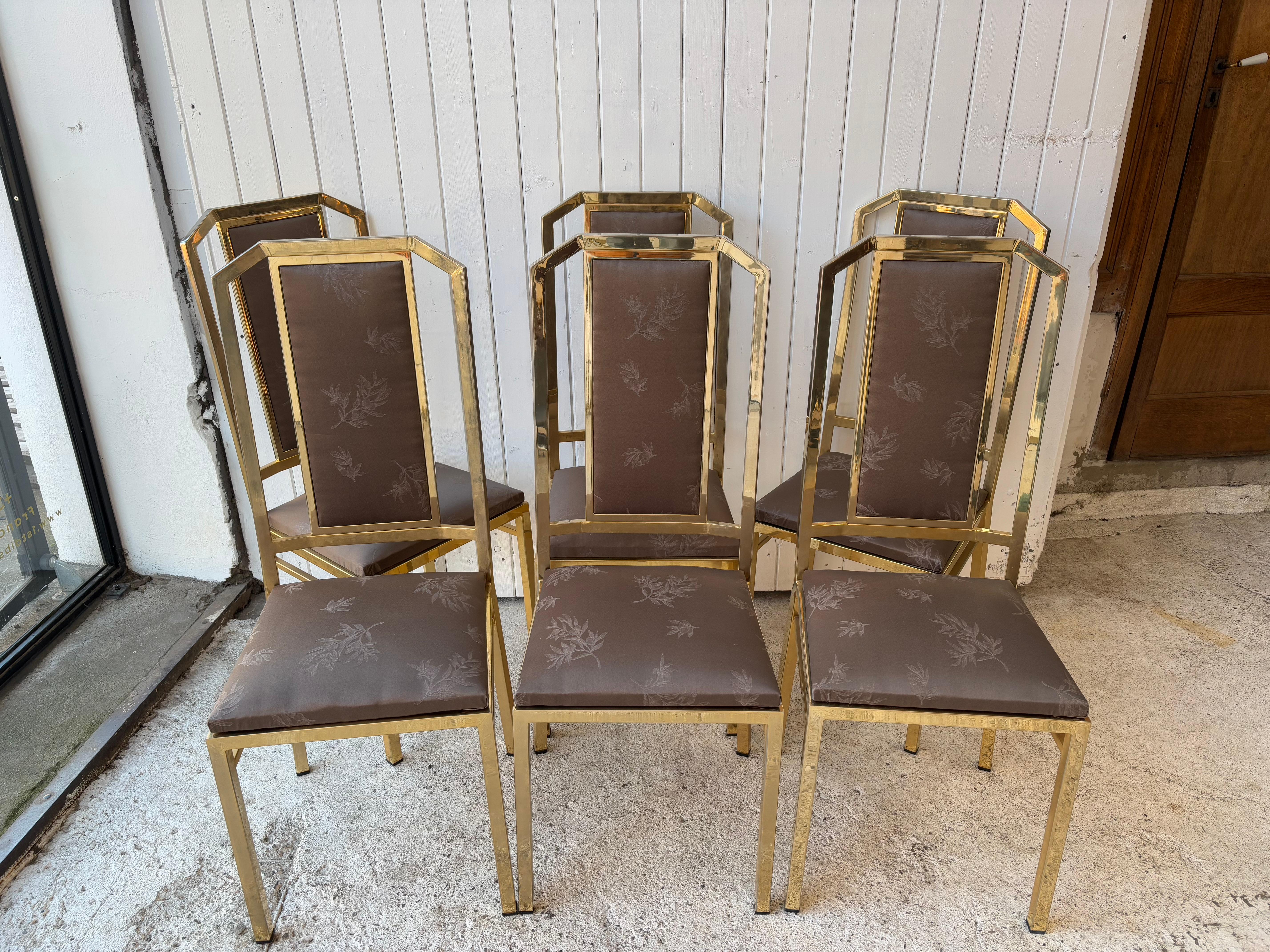 Nice set of 6 chairs by JC Mahey , 1970’s
Chairs are completely recover in chocolat textile and cute  gold Flowers (lys)
Structure is golded metal and in perfection condition 
Sizes are ideal for your inside 1970/80
