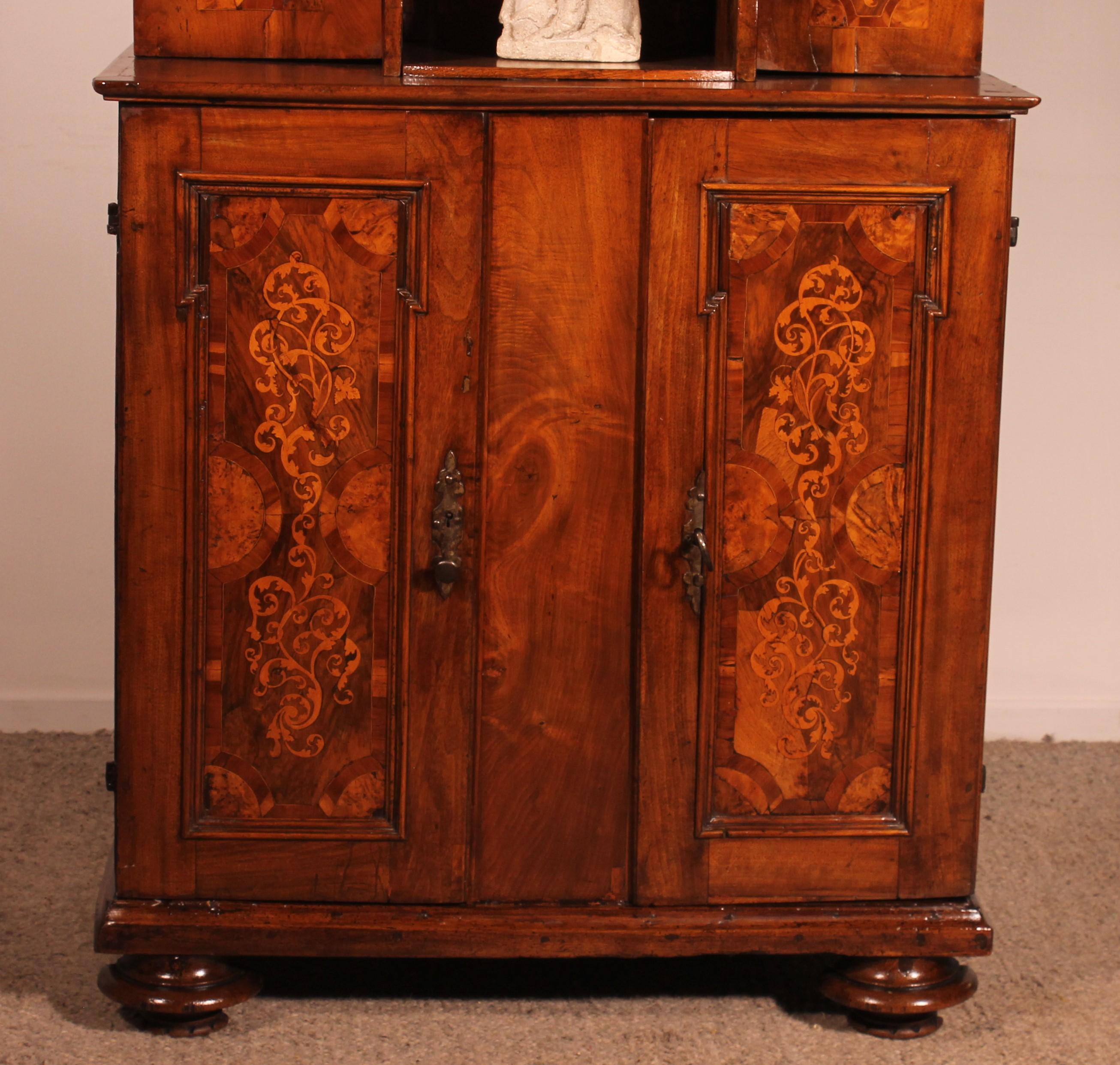 Superb small 6-door buffet in walnut from the 17th century dated 1639 from northern Italy

Very beautiful, unique piece of furniture with a small niche in its center. We have placed a stone sculpture of a virgin that we can sell with the buffet if