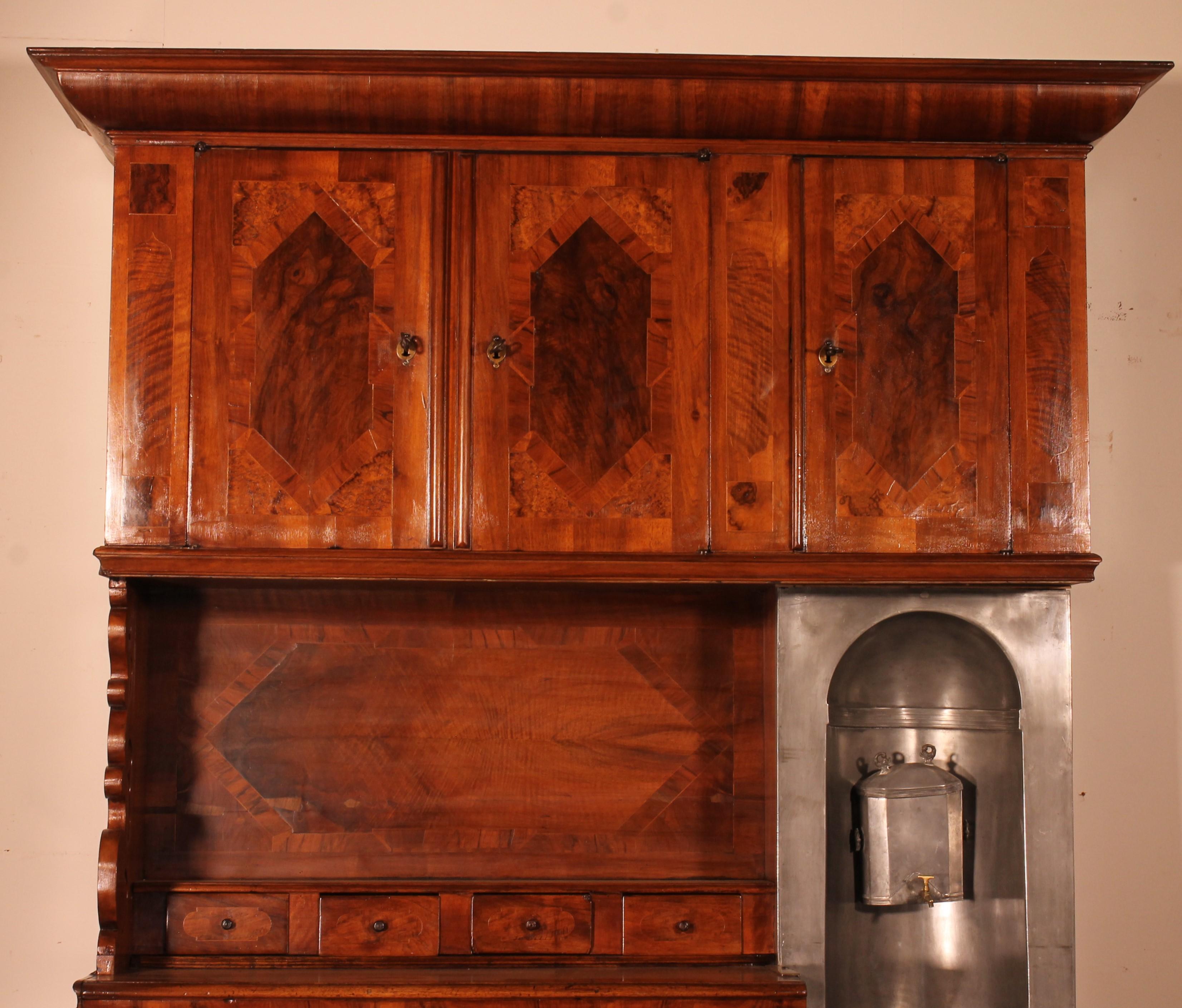Superb 6-door walnut cabinet from the 17th century in Louis XIV style, probably Switzerland.
Very beautiful unique piece of furniture with a fountain which stands out from the usual sideboards. The first we have seen in 50 years

Superb walnut