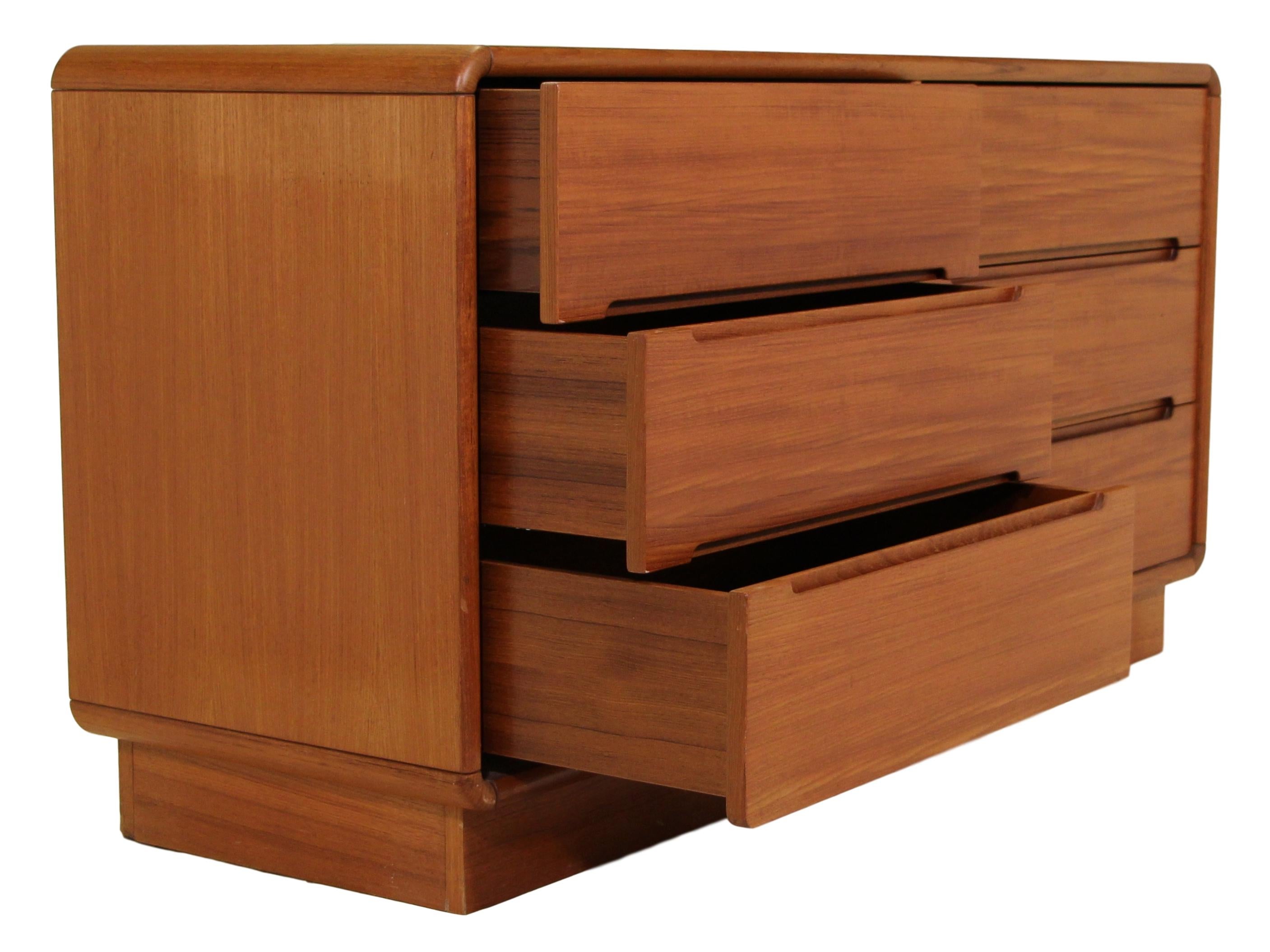 Sturdy and well built 6-drawer dresser by Sun Cabinet. All drawers glide well.

Very good condition. There is an indentation/scratch in the right side edge. There is a discolored mark on the back left side of the top.
Dimensions: 57.5