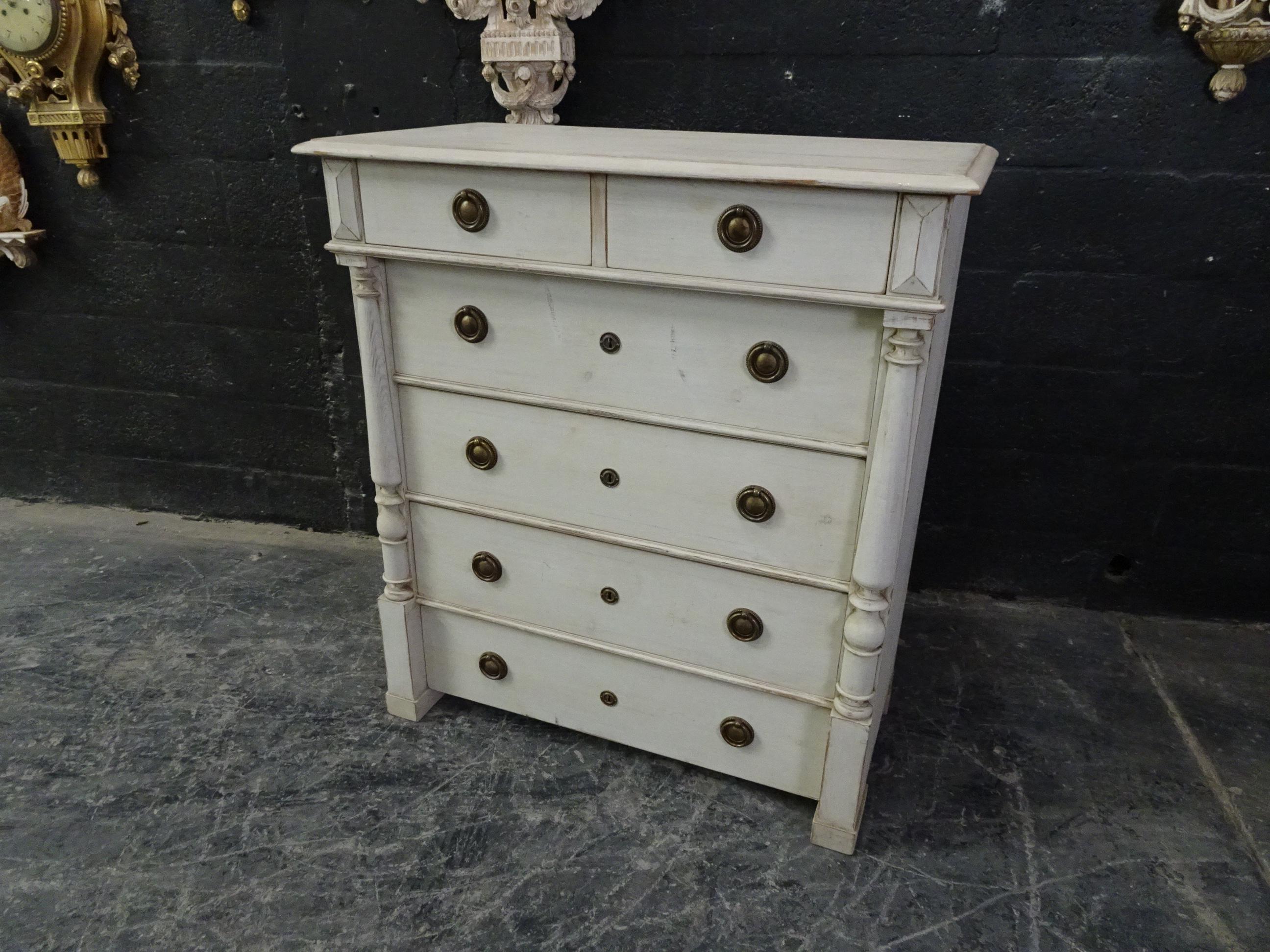 This is a 6 drawer Swedish Gustavian tall chest, its been restored and repainted with milk paints 