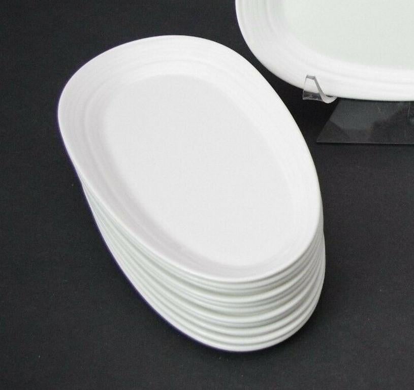 Set de (6) Platos de Porcelana Dudson Virgin Atlantic Airways de Robert Welch 
Muy práctico, duradero y con una forma maravillosa.

9 1/2