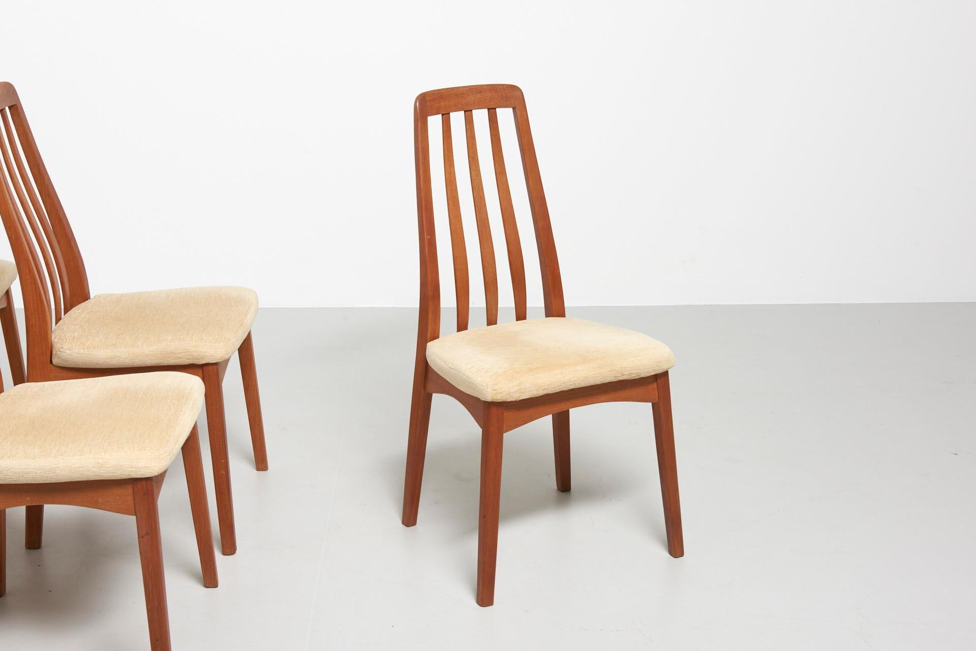 A set of 6 teak 'Eva' chairs by Niels Koefoed in teak with velvet seating’s.