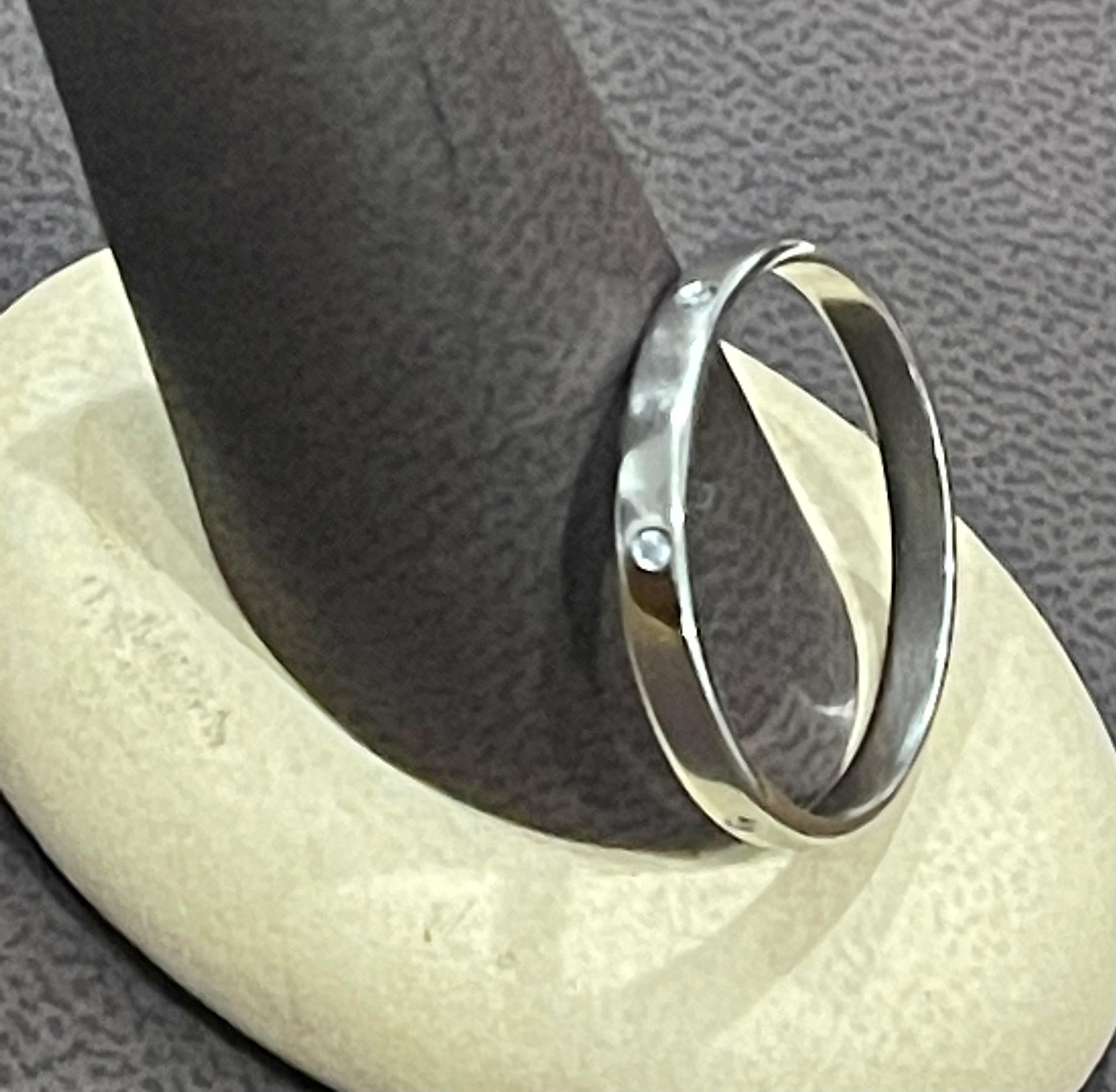 6 Flush Set Bezel Diamond Eternity Wedding Band in 14 Karat White Gold Size 11.5 
Very clean and shiny diamonds.
This eternity band features Gypsy set or burnished, the bright white diamonds , 14k gold band ring shines brightly and is a perennial