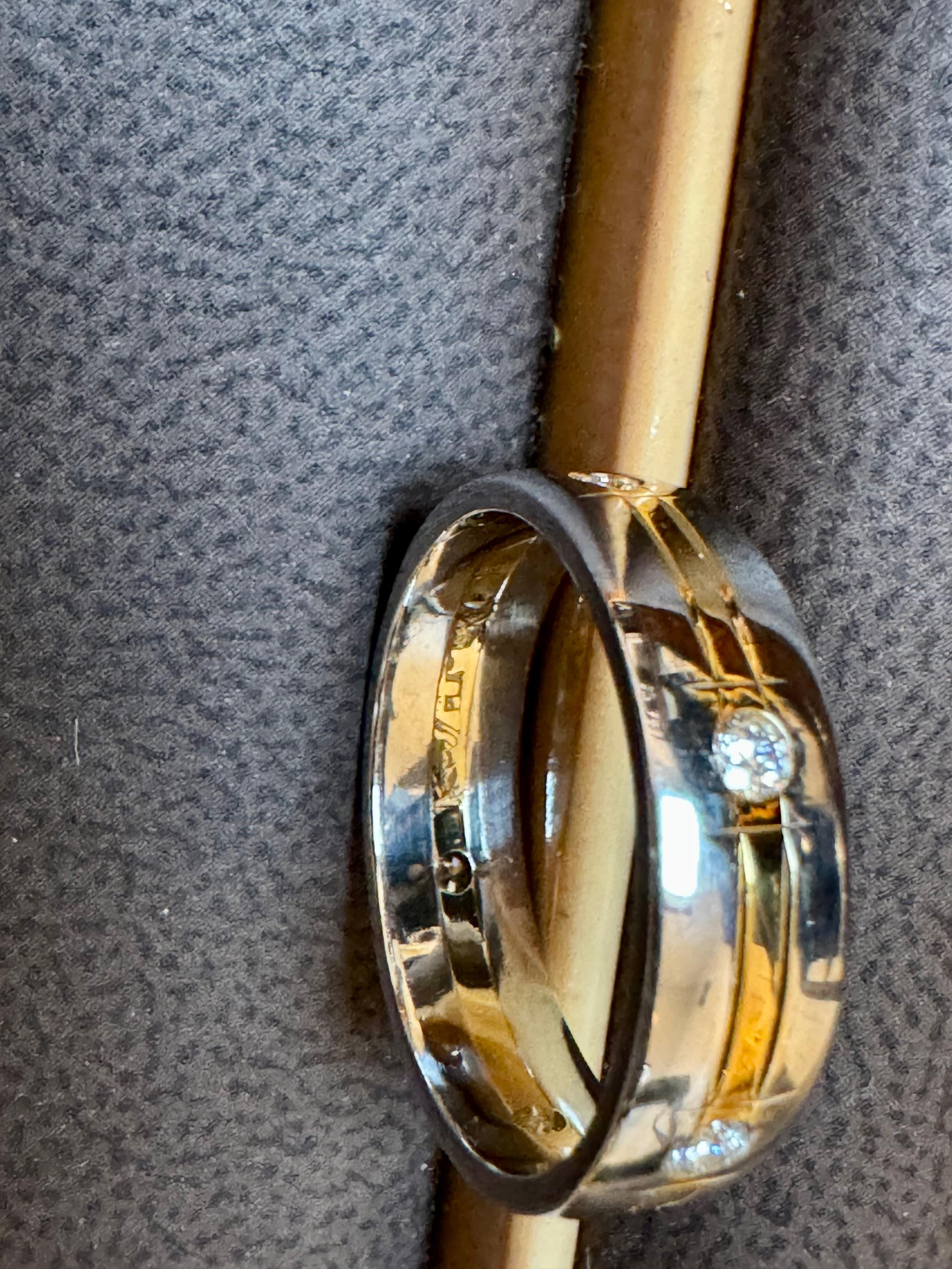 6 Flush Set Diamond Eternity Band in Platinum, Two Tone, Size 10, Unisex
950 Platinum / 18 Karat Yellow Gold ,Round Brilliant Bezel Set 6mm Comfort Fit Two Tone Diamond Band 
It is a two tone ring, Center has Two yellow gold lines going around the