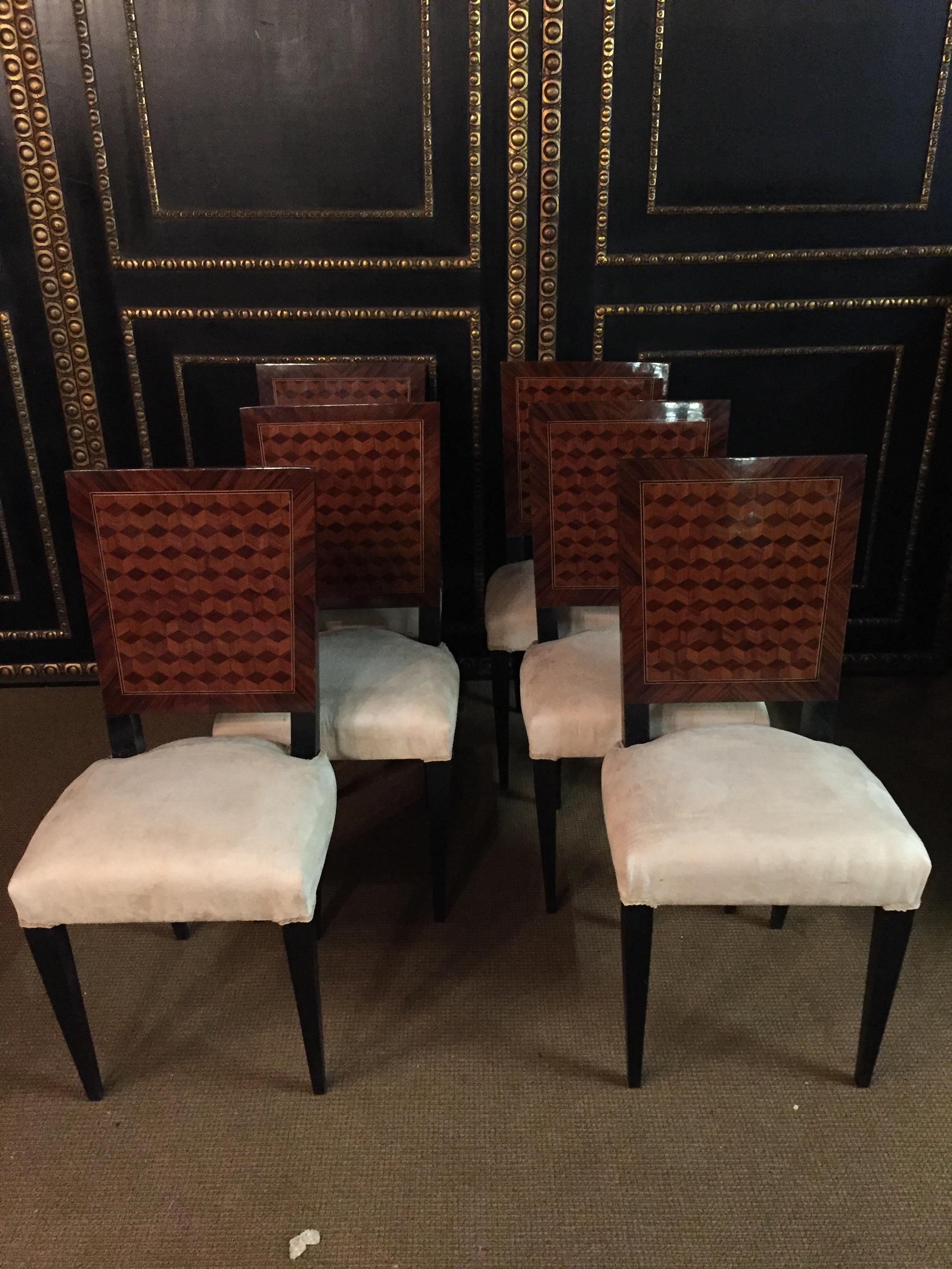 Classical French chairs in the Art Deco Stil.
Solid beech wood with mahogany veneer.
Backrest front and back with beautiful inlaid work.
Seat upholstered and covered.