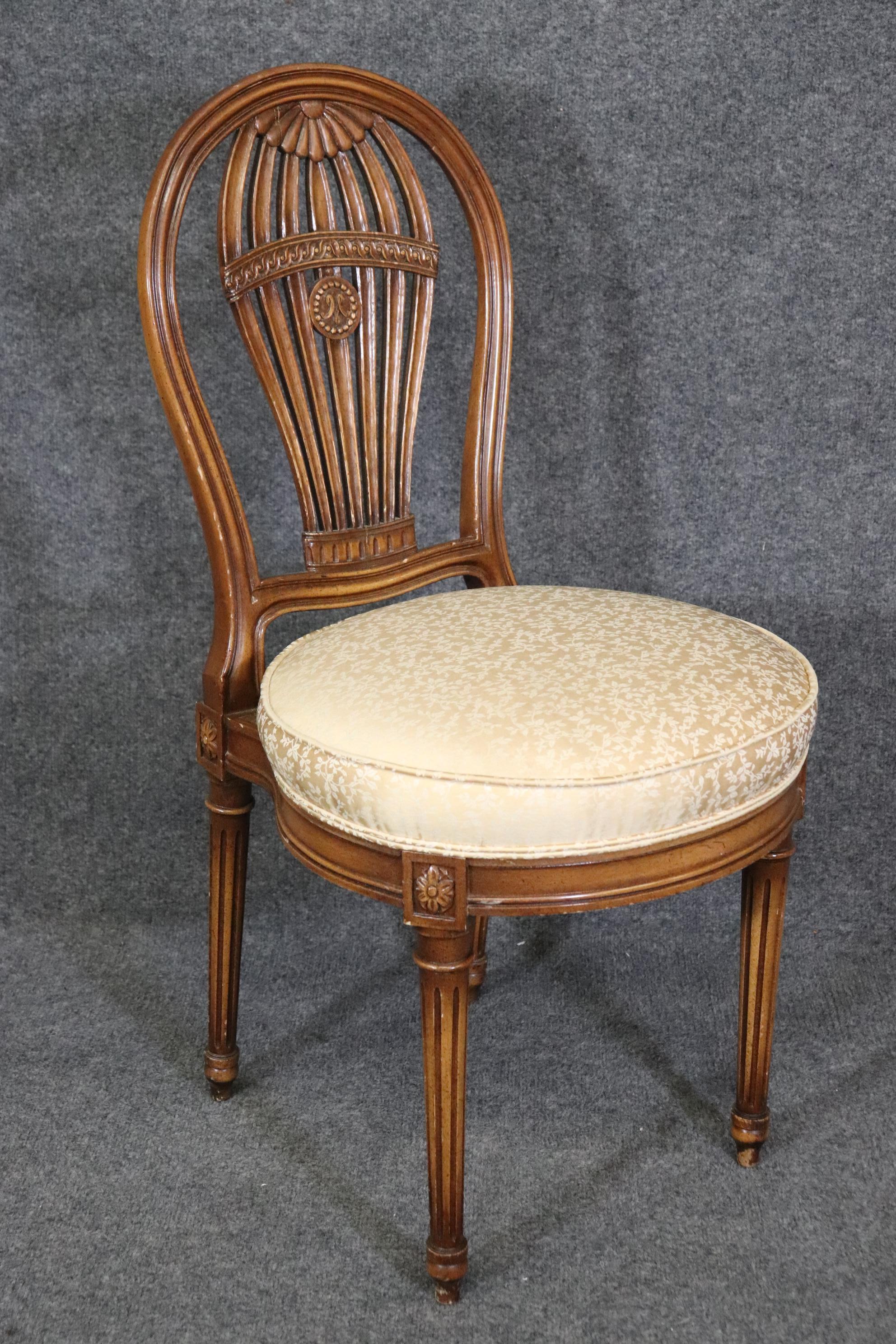 Dimensions- H: 36 1/4in W: 18 1/2in D: 21in SH: 19 1/2in 
This Set of 6 French Louis XVI Style Balloon Dining Chairs In The Manner of Maison Jansen are absolutely spectacular! These chairs are known for being one of the most famous designs done by