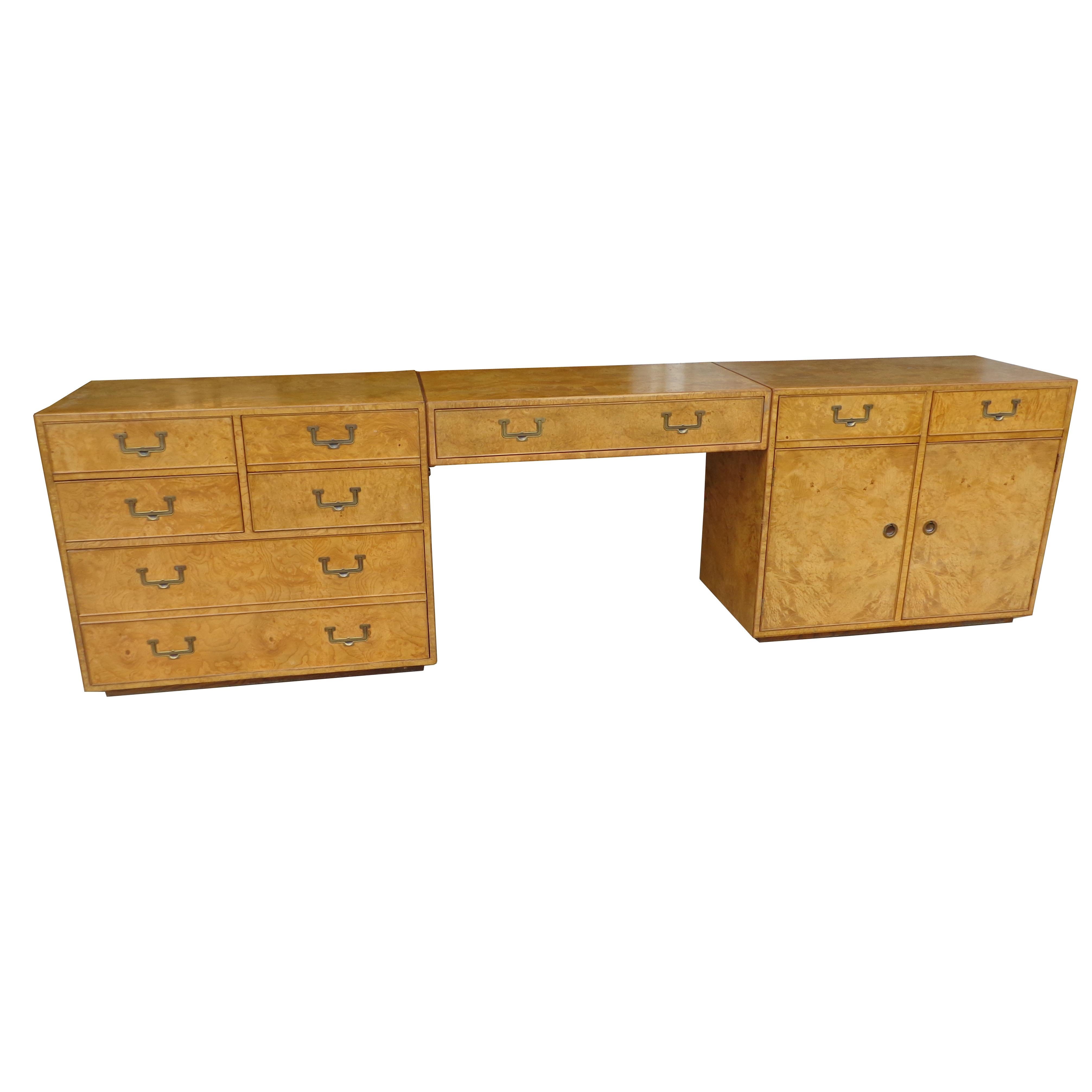 John Widdicomb burl kneehole credenza dresser.

 
John Widdicomb mid century campaign style 3 piece credenza.
Features 8 drawers with 2 for files and a closed cabinet. Brass recessed pulls.

Dimensions:
Height: 30.5 
Width: 72 
Depth: 19.
