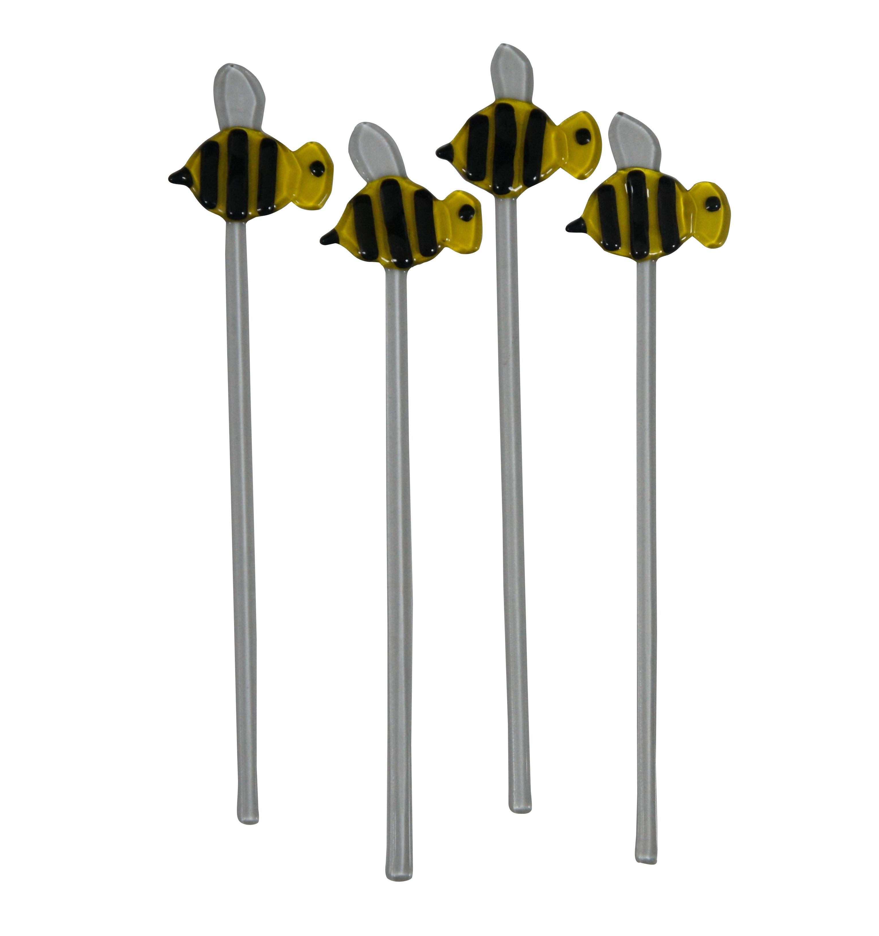 Six vintage fused glass decorative plant stakes / sticks. Four in the shape of yellow and black bumble bees and two yellow birds.

Dimensions:
3