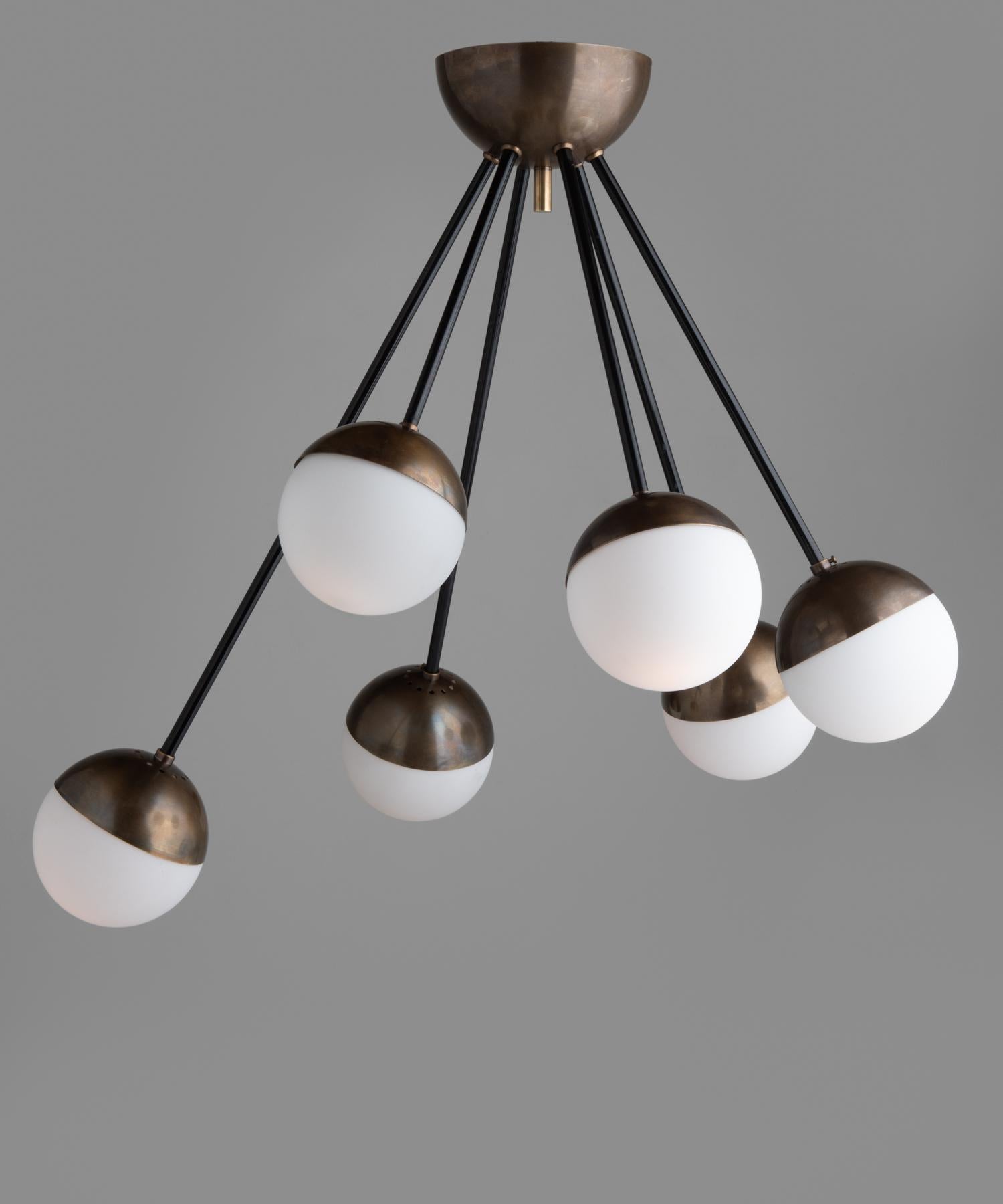 6-Globe Modern Chandelier
Made in Italy
Flush mount brass and steel fixture with six cascading frosted glass globes.
22