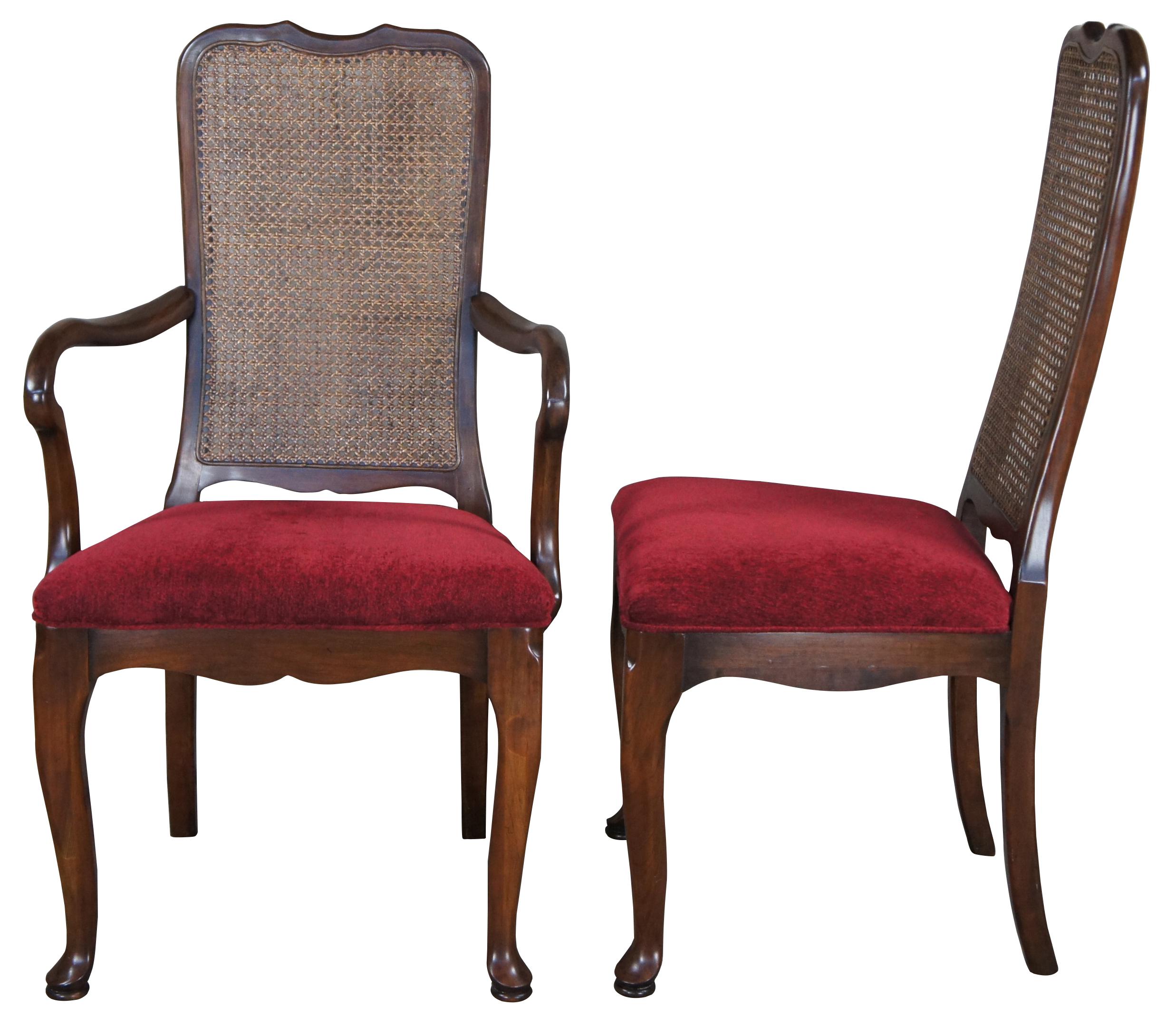 Six vintage dining chairs by Harden Furniture, circa 1958. Made of solid cherry featuring a crest rail leading to caned backs, red upholstery and cabriole leds leading to pad feet. Includes a serpentine seat apron and chamfered corners just beneath