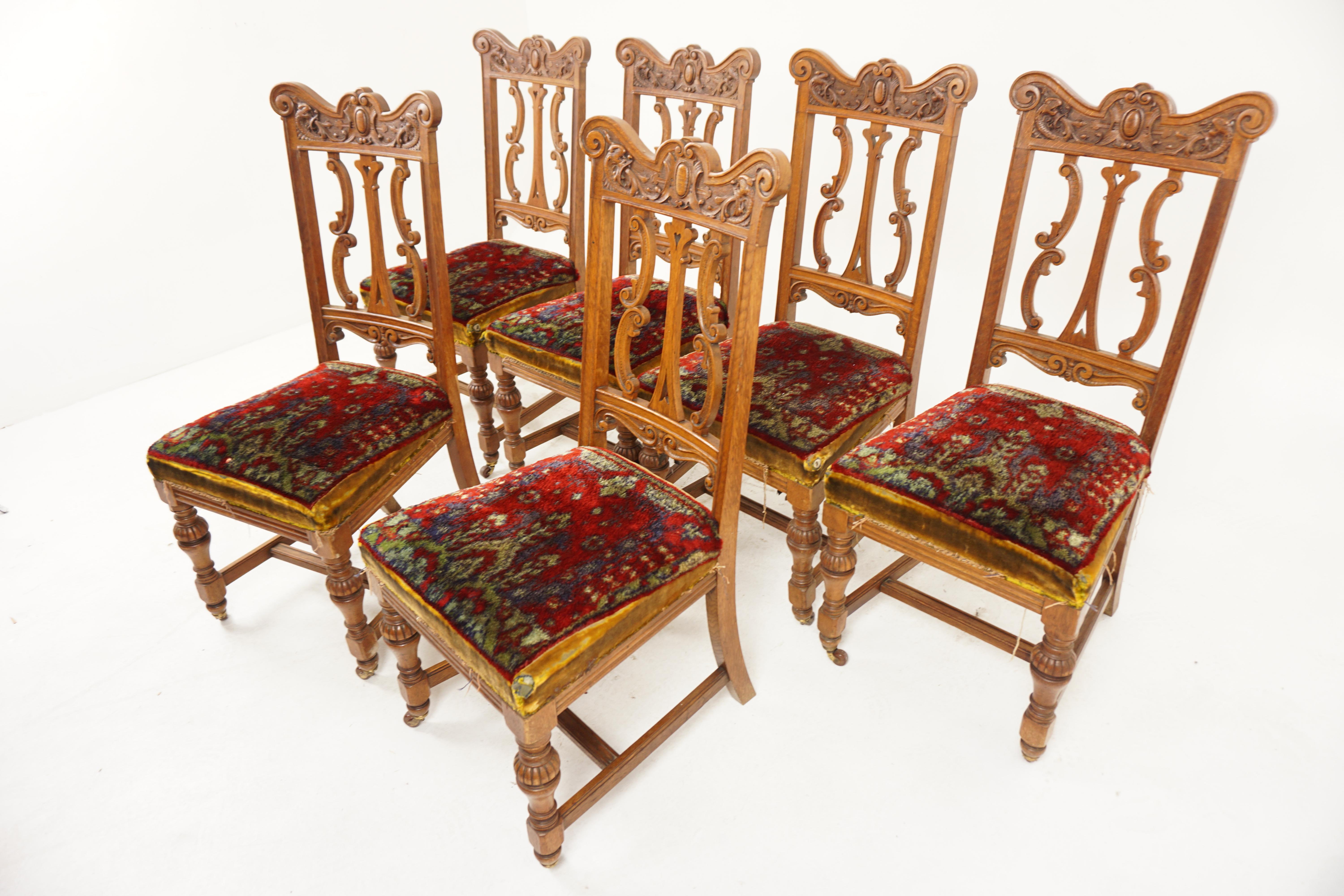 6 Heavily Carved Victorian Oak Upholstered Dining Chairs, Scotland 1880, H994

Scotland 1880
Solid Oak
Original finish
Heavily carved top rail
With sturdy supports to the ends
Three carved shaped splats on the back
Upholstered seat with spring